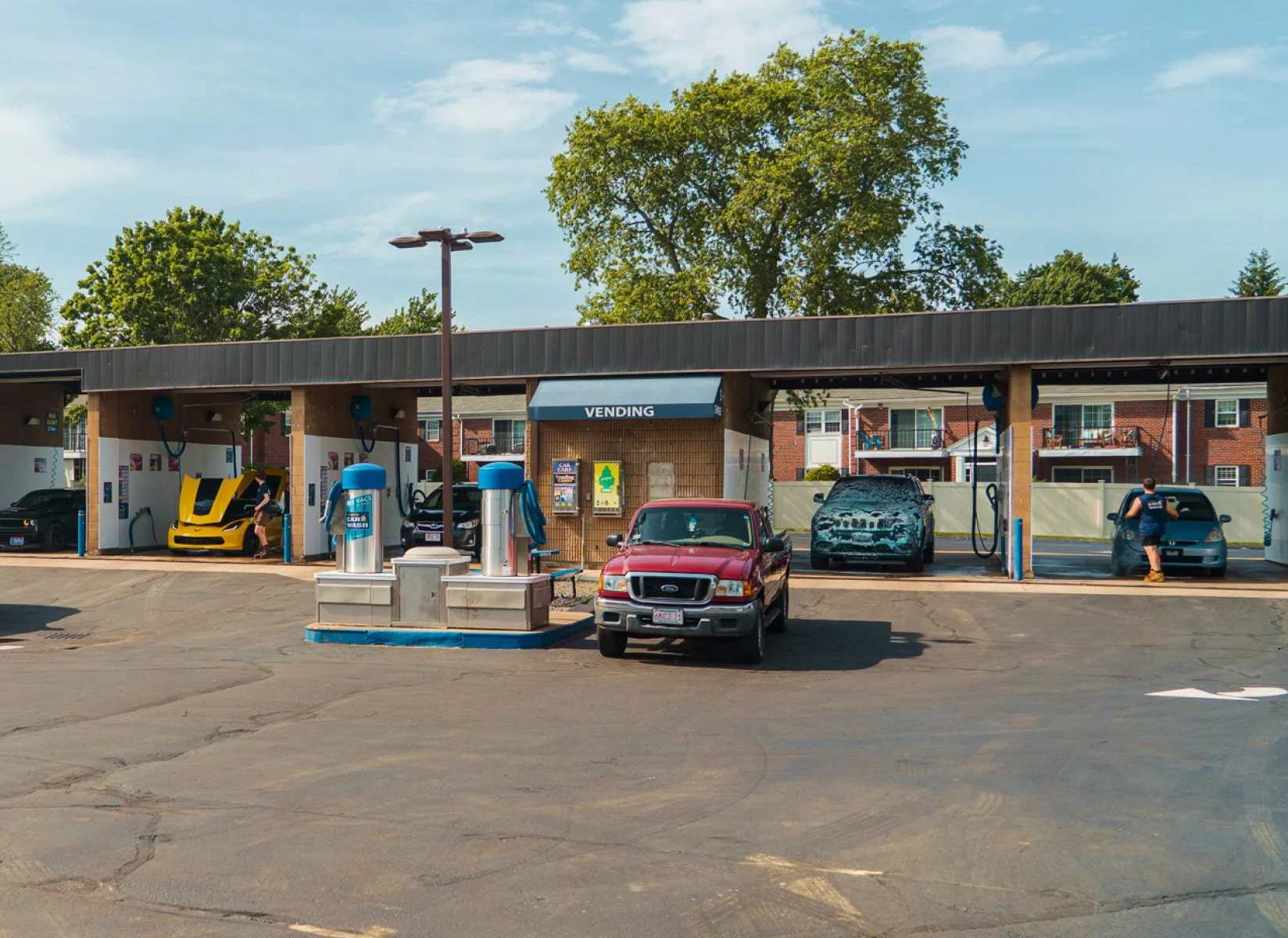 Self-service wash bays at The Franklin Car Wash in Franklin, Massachusetts