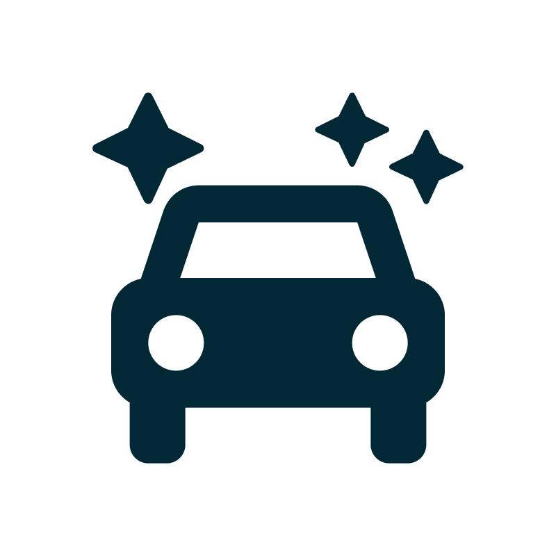 Icon of a car with sparkles around it, symbolizing cleanliness or shine.