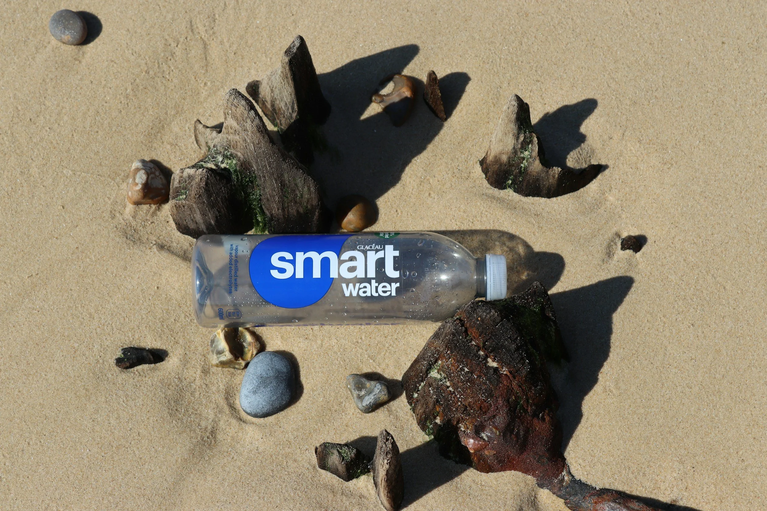 smart water bottle on a beach