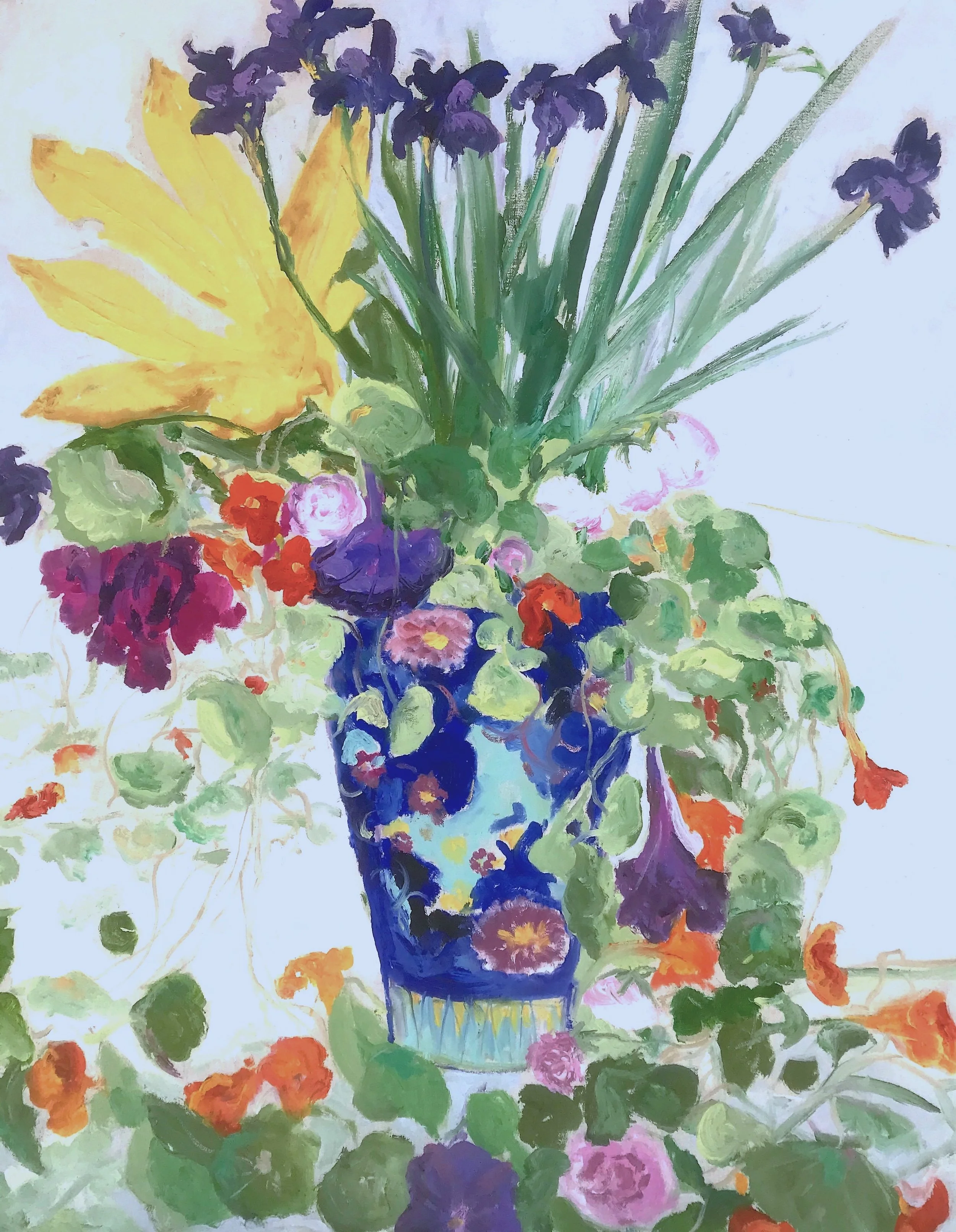 A colorful floral still life painting of a bouquet in a blue vase, including purple, yellow, orange, pink, and green flowers and leaves.