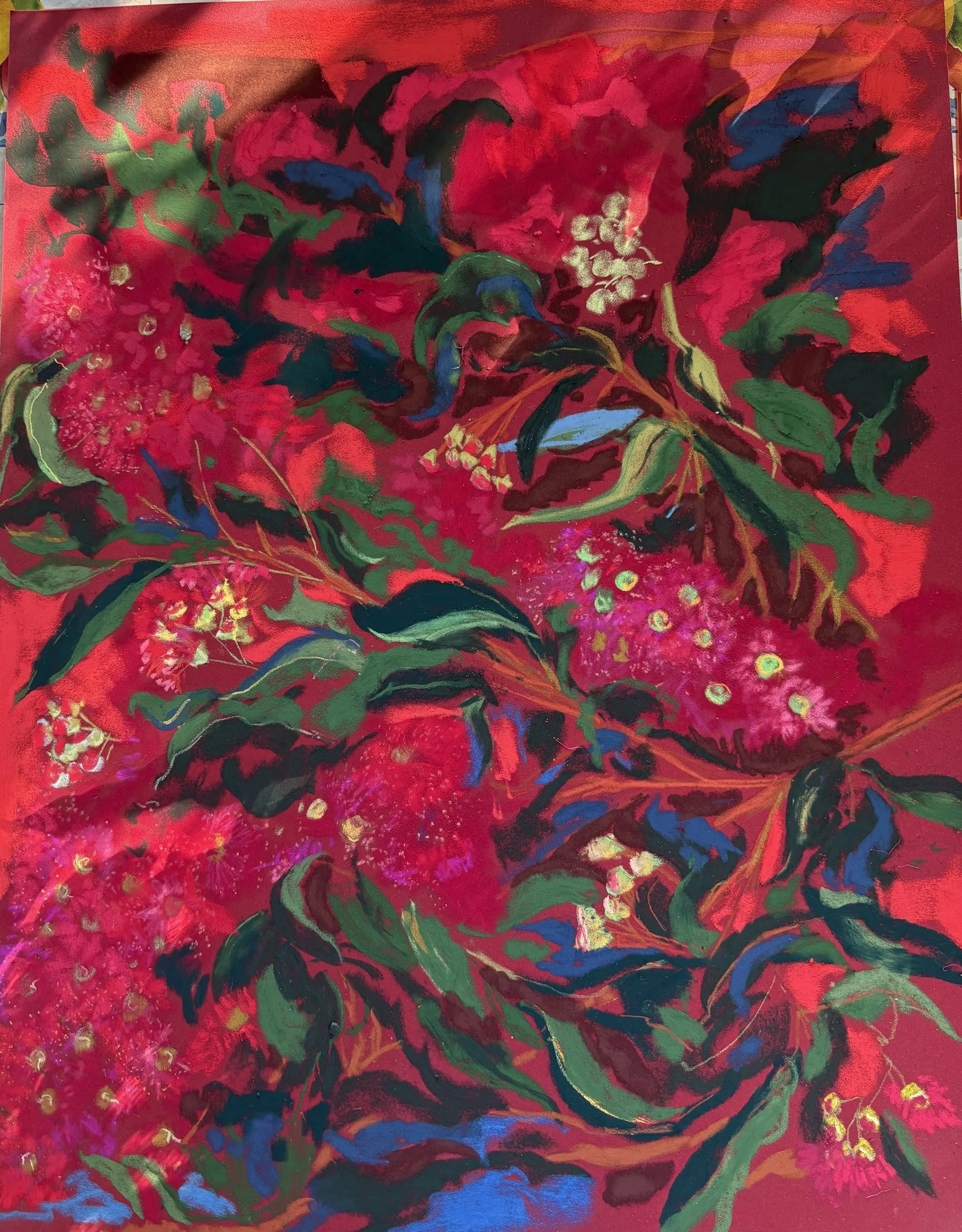 A vibrant abstract painting filled with reds, greens, blues, and gold accents, resembling a lush, colorful garden or floral scene.