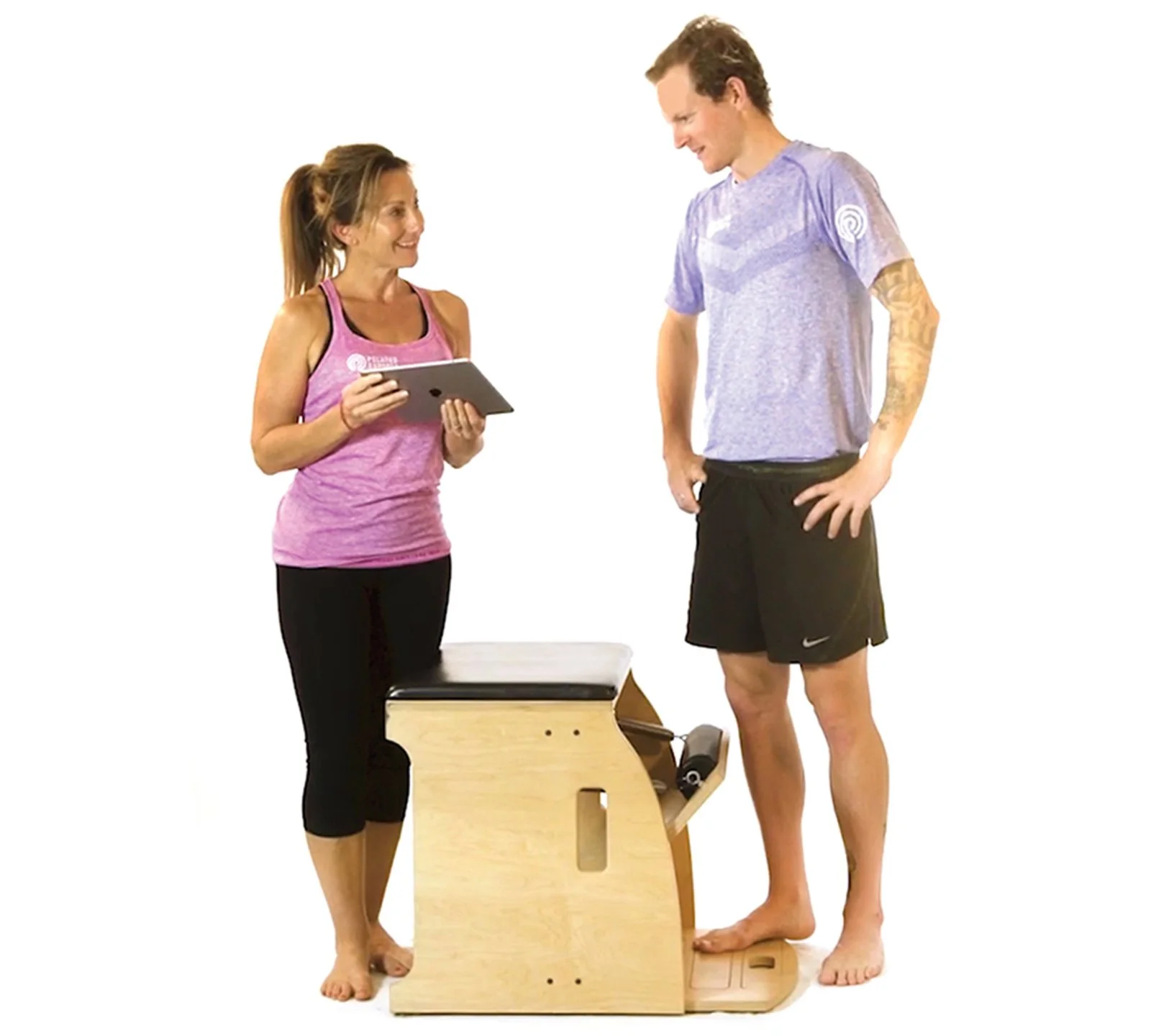Pilates instructor giving one-to-one attention to a client at Red Rock Pilates Sandringham