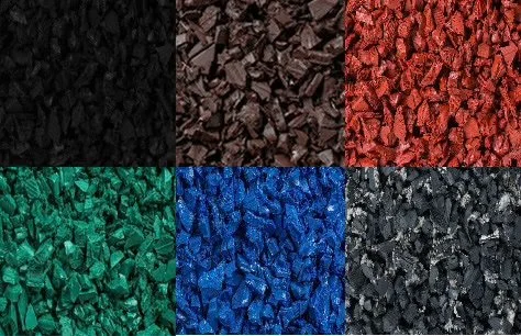 Close-up of six different colored crushed coal or charcoal pieces arranged in a grid.