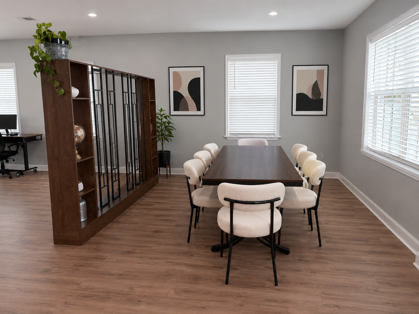 Conference area
“Conference and meeting area at The Den in Bluffton with a large table and comfortable seating.”
