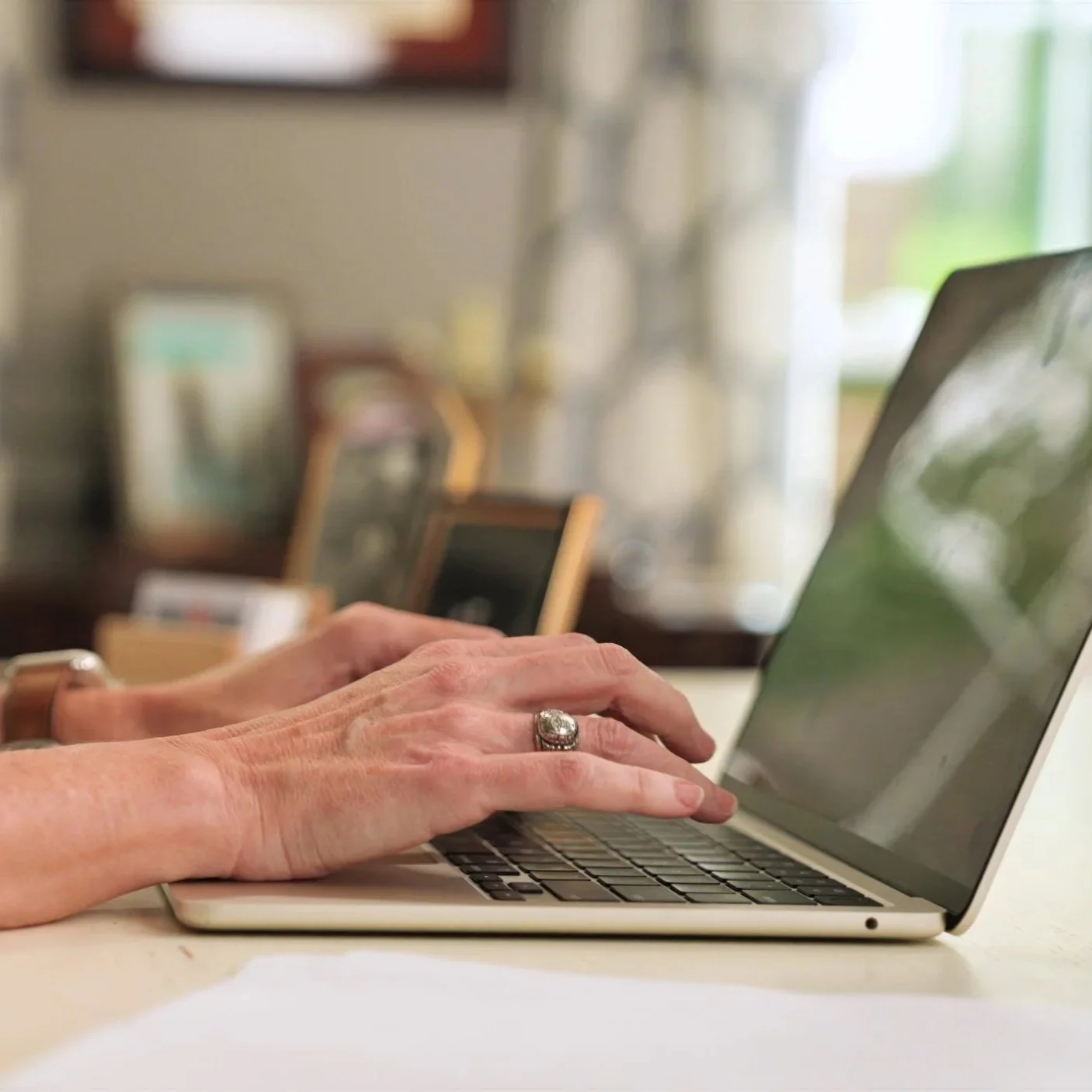 Thrive writing a grant on a computer for a Guidestar listed nonprofit serving nationwide.