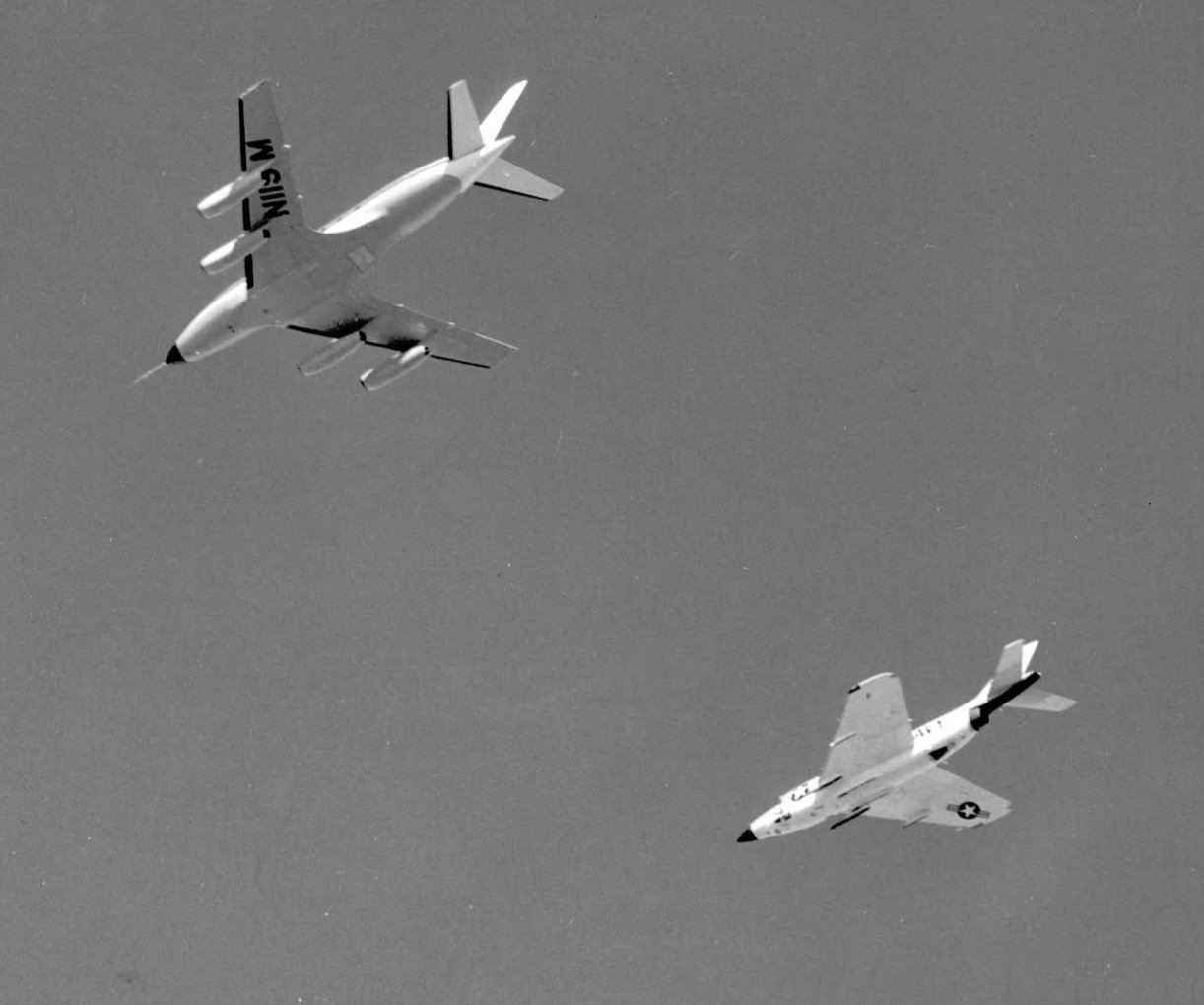 The McDonnell 220 in formation with another McDonnell Aircraft Corporation aircraft, the F3H Demon