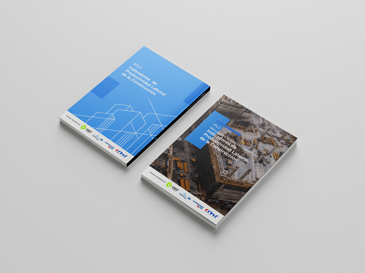 Dos libros sobre productividad laboral en construcción, uno con portada azul y el otro con portada con imagen de construcción, ambos en una superficie gris.