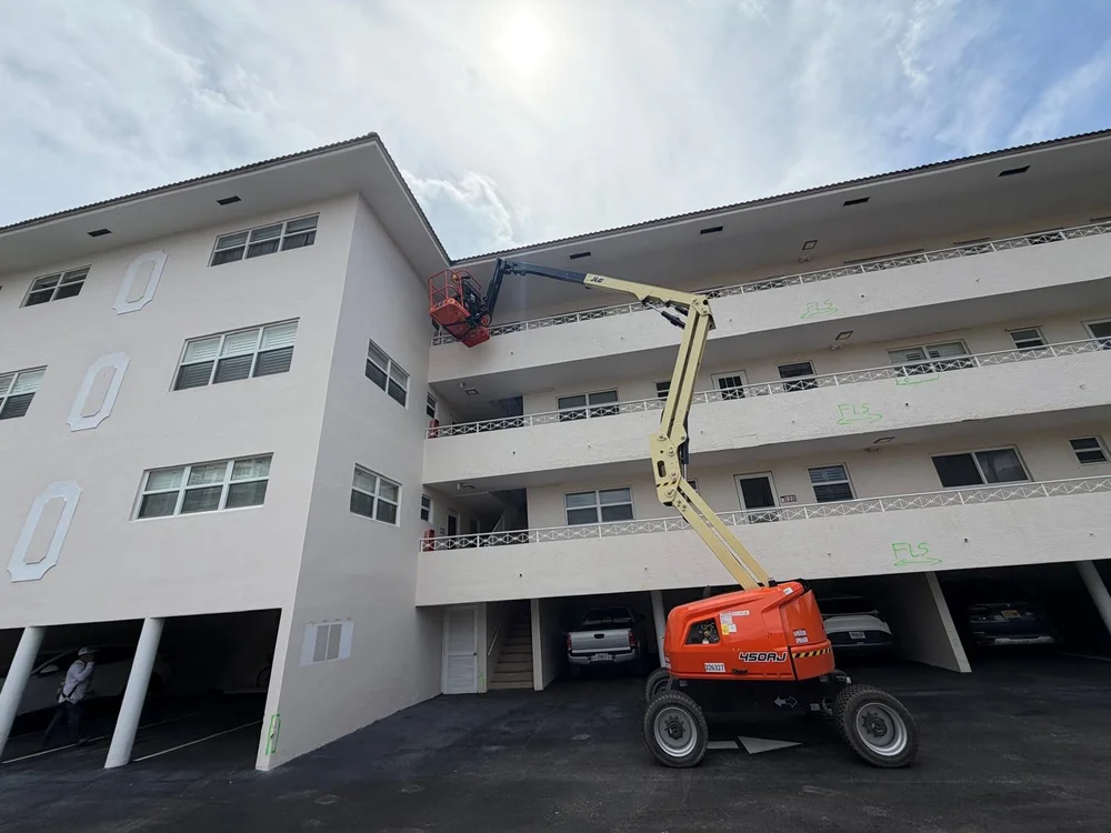 Exterior building restoration using lift equipment