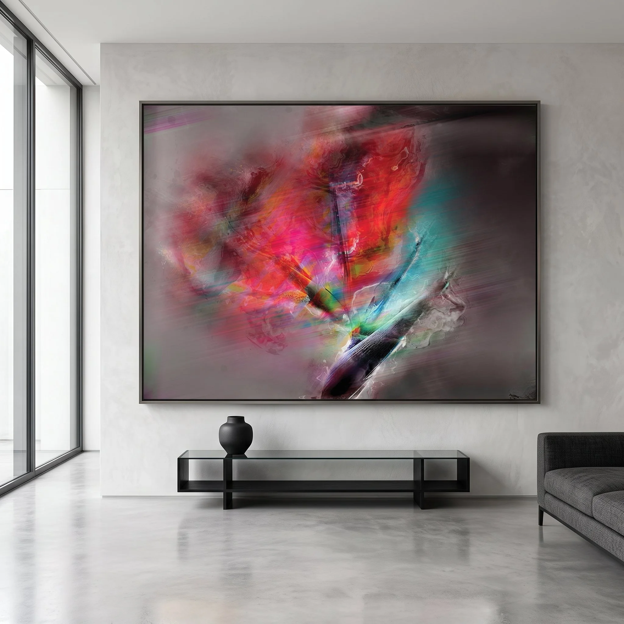 Large canvas art with a vibrant red and teal abstract design hanging above a sleek black console table in a minimalist luxury room with polished concrete floors and large windows.