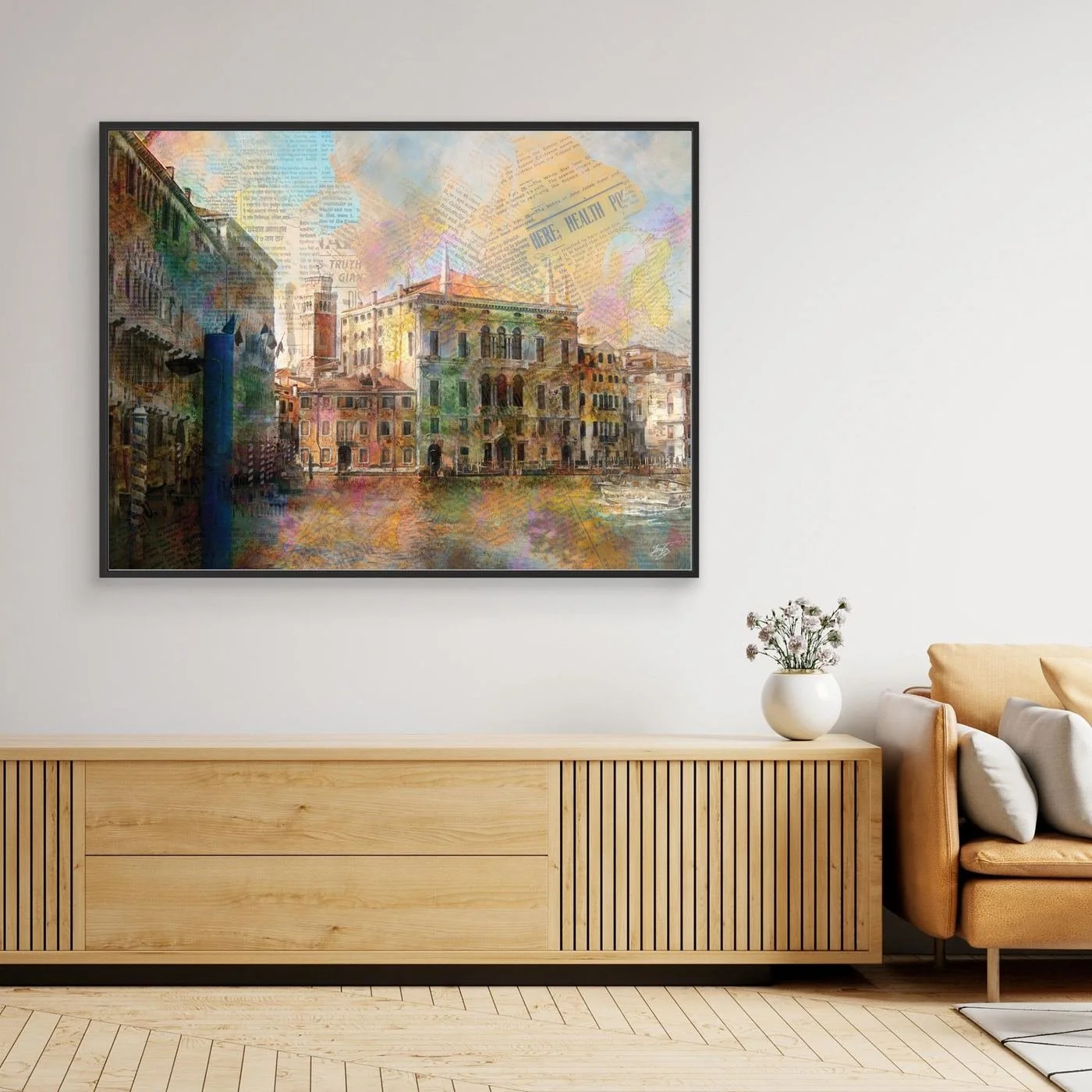 Fine art print collage of Venice featuring historic palazzo architecture overlaid with vintage newspaper clippings and vibrant watercolor textures, framed and ready to hang. Over wooden console