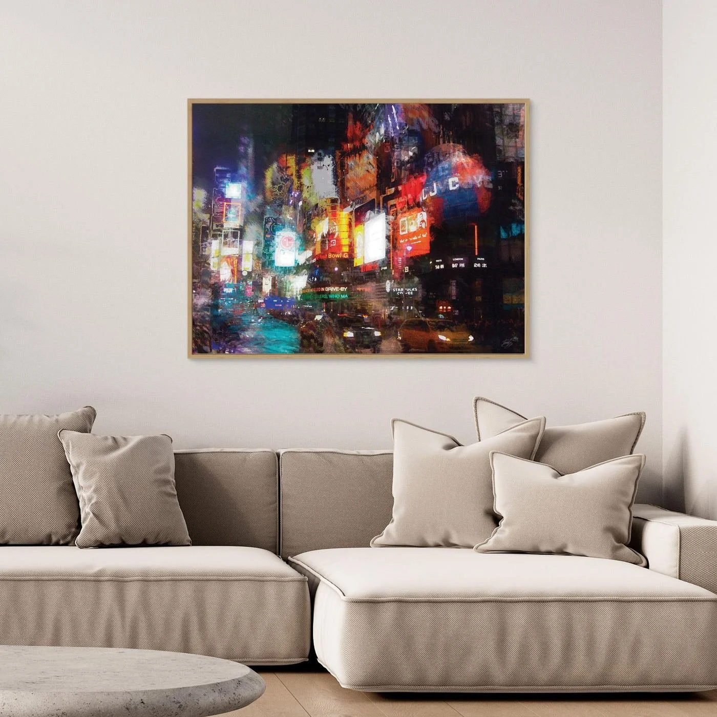 Expressionist art print of a vibrant night landscape of Times Square, with textured illuminated billboards, city traffic, and glowing neon reflections, framed and ready to hang. Over grey couch
