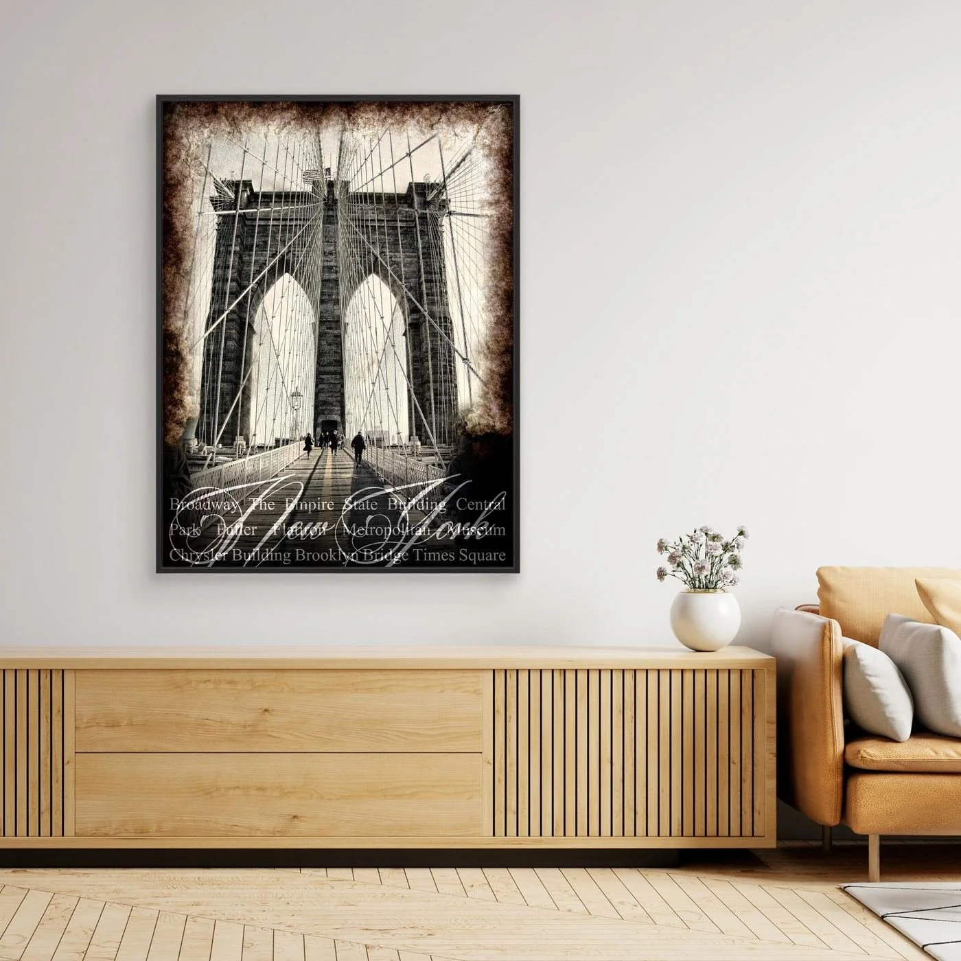 Vintage fine art print of New York City of Brooklyn Bridge with a textured sepia background and elegant typography of NYC landmarks, framed and ready to hang. Over wooden console