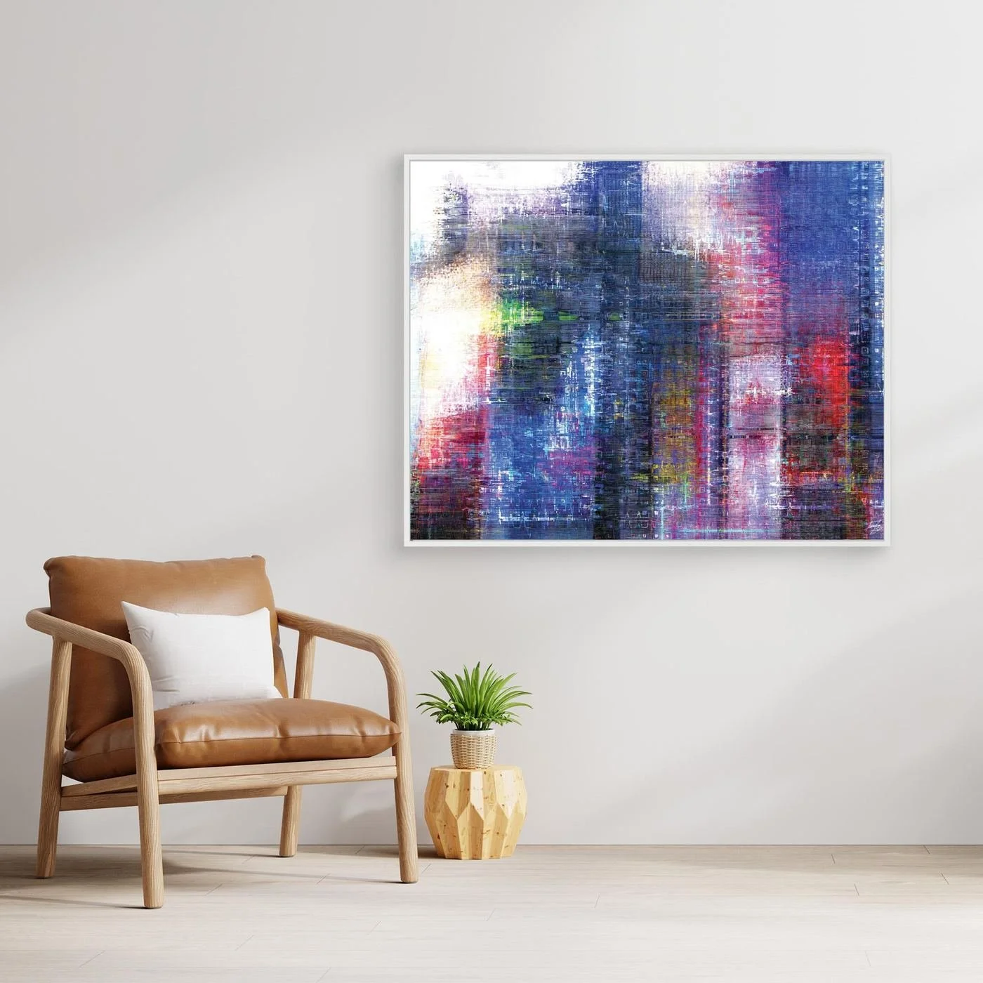 Abstract fine art print evoking a textured city skyline with vertical lines in deep blue, purple, and red tones, framed and ready to hang. with chair