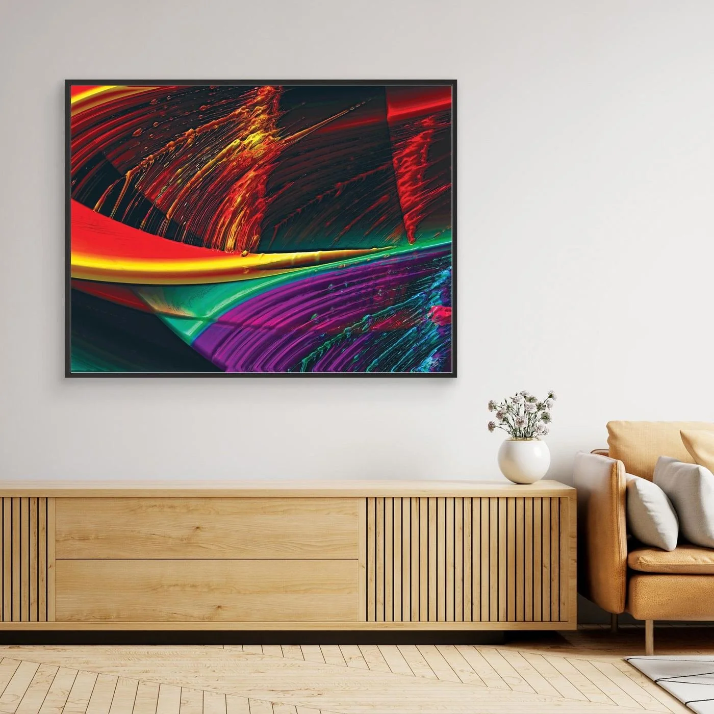 Abstract fine art print with high-gloss liquid textures, showcasing heavy 3D brushstrokes in fiery red, bright yellow, green, and deep purple tones, framed and ready to hang. Over wooden console
