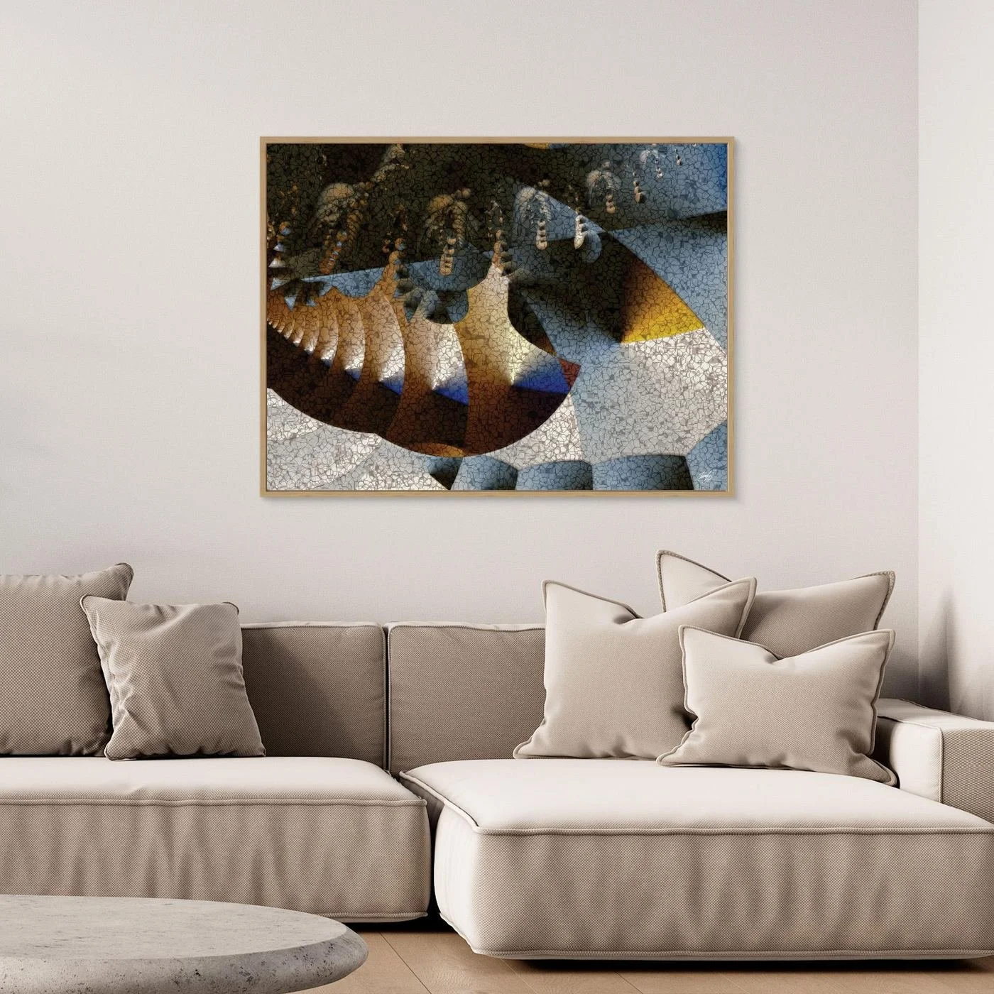 Abstract fine art print featuring textured geometric shapes, mosaic patterns, and a color palette of gold, brown, and blue, framed and ready to hang. Over grey sofa