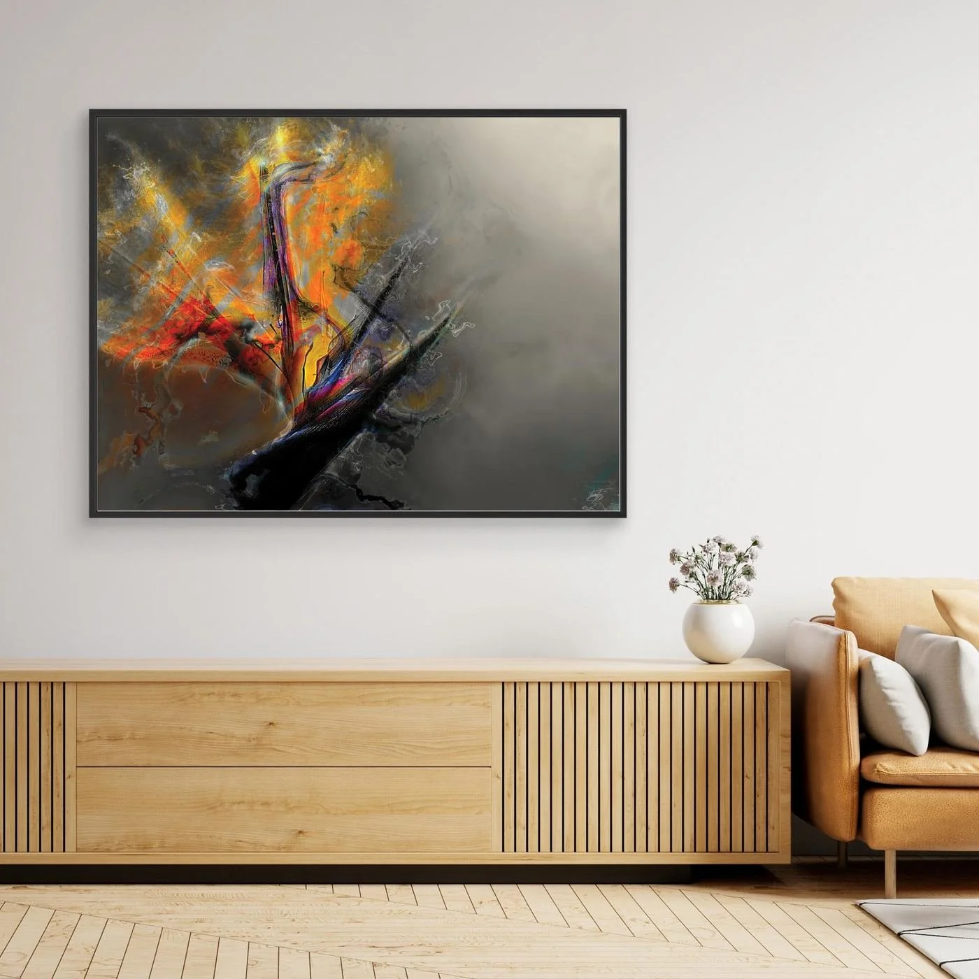 Abstract fine art print with dramatic explosion of textured orange, yellow, and red fiery shapes contrasting against a smoky gray background, framed and ready to hang. Over wooden console
