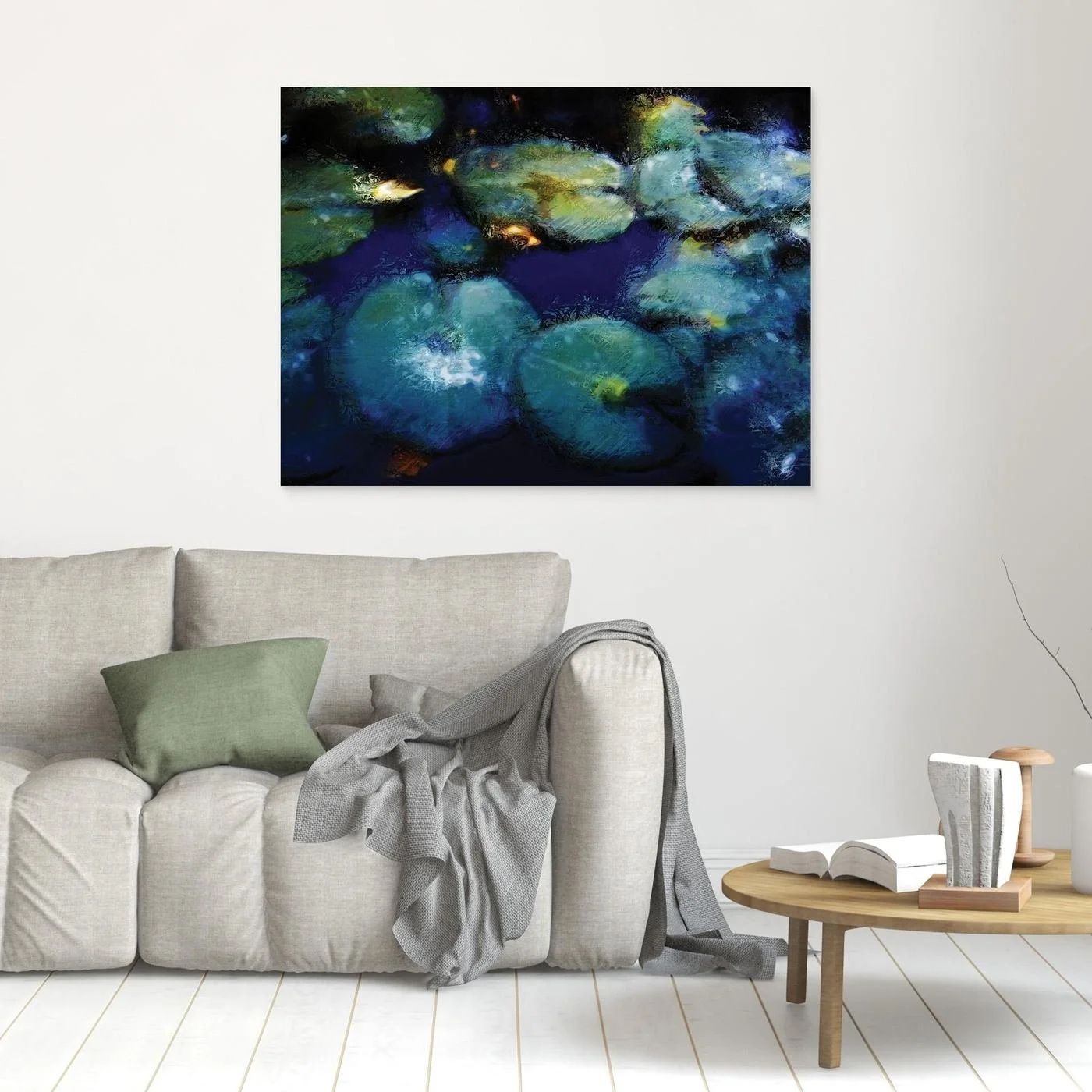 Abstract fine art print evoking a serene pond with lily pads in deep blue, teal, and green tones with impressionistic light textures, framed and ready to hang. In living room