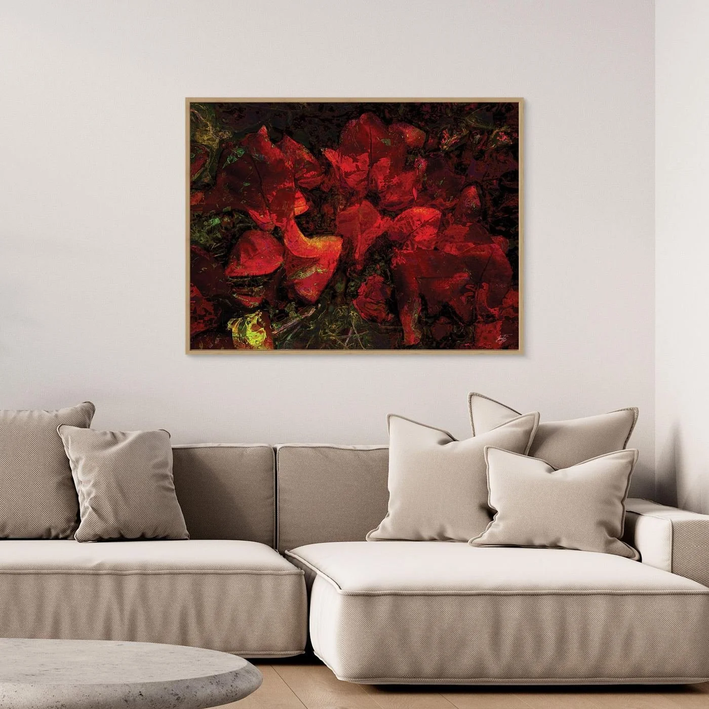 Dark abstract fine art print showcasing a dense, moody floral pattern in deep crimson red and burgundy tones against a textured black background, framed and ready to hang. Over grey couch