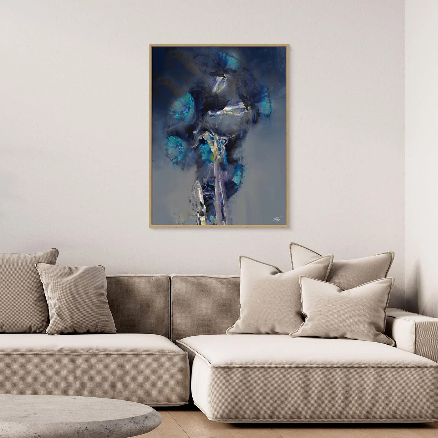 Moody abstract fine art print showcasing ethereal translucent flowers in deep navy blue, teal, and glowing turquoise tones over a smoky gray background, framed and ready to hang. Over grey couch