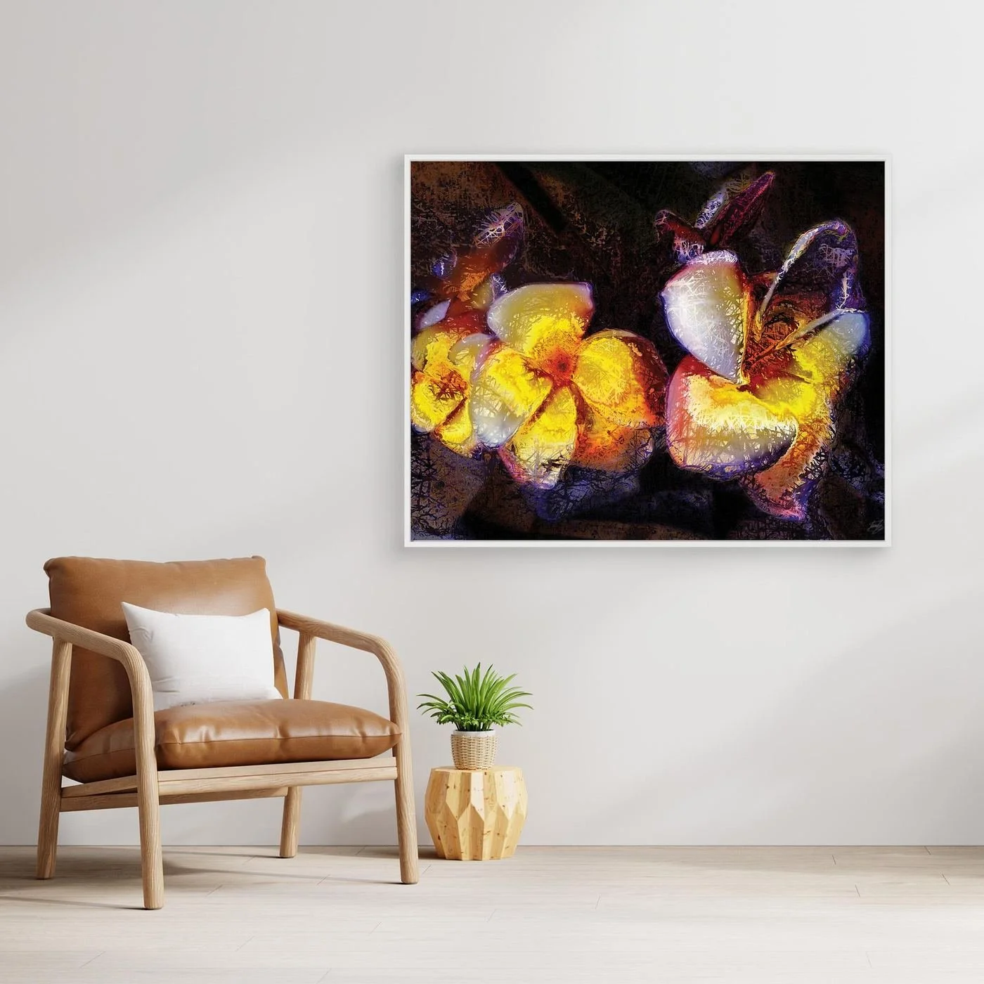 Abstract fine art print featuring textured glowing frangipani plumeria flowers in yellow and orange tones against a dark, moody background, framed and ready to hang. With chair