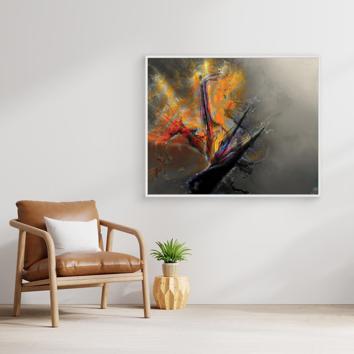 Abstract fine art print with dramatic explosion of textured orange, yellow, and red fiery shapes contrasting against a smoky gray background, framed and ready to hang. With chair