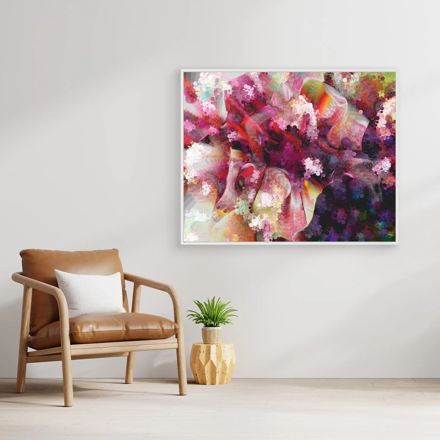 Vibrant abstract fine art print featuring pink, purple, and red floral textures, framed and ready to hang. With chair