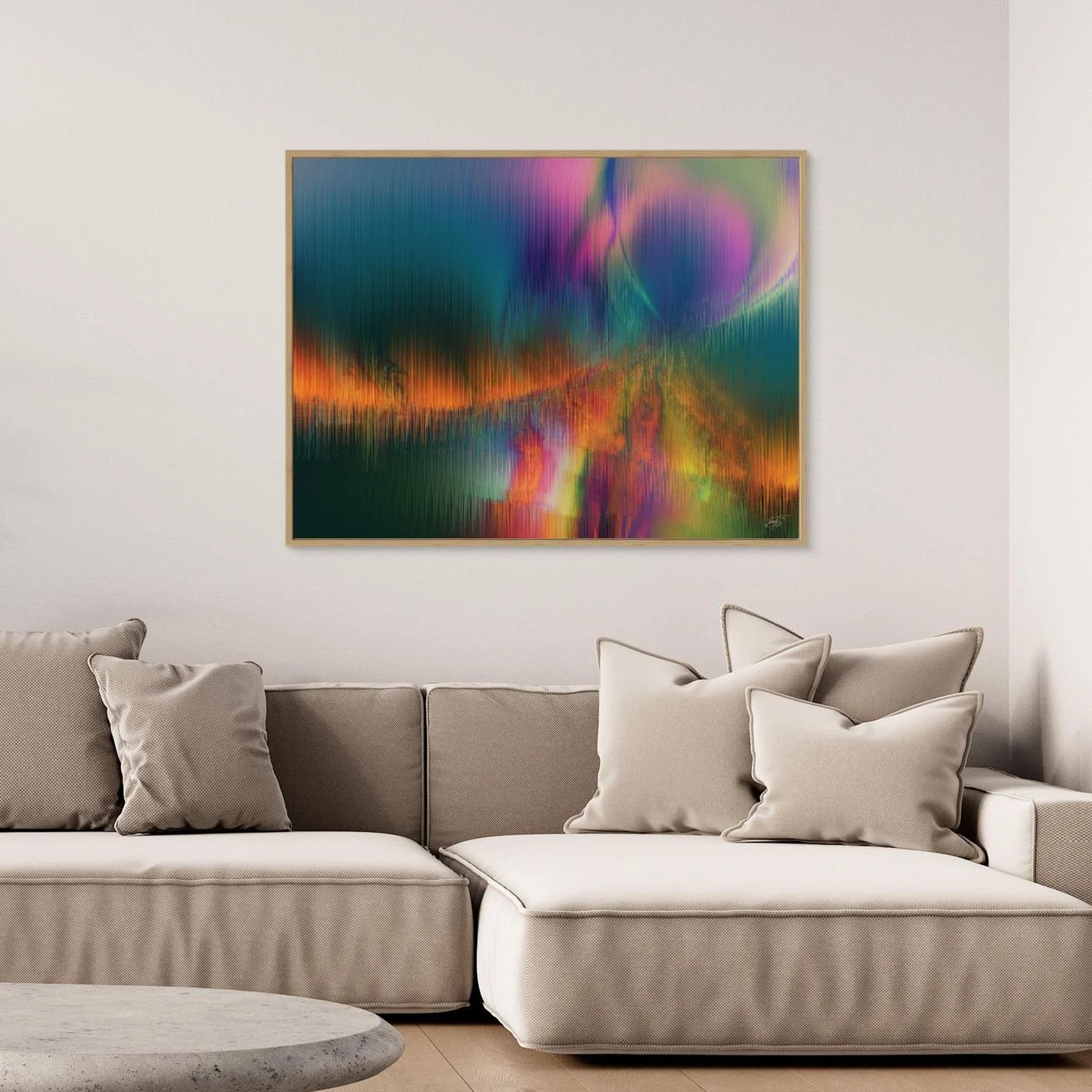 Abstract fine art print featuring vertical line textures reminiscent of a colorful landscape or aurora borealis with green, purple, and fiery orange tones, framed and ready to hang. Over grey couch