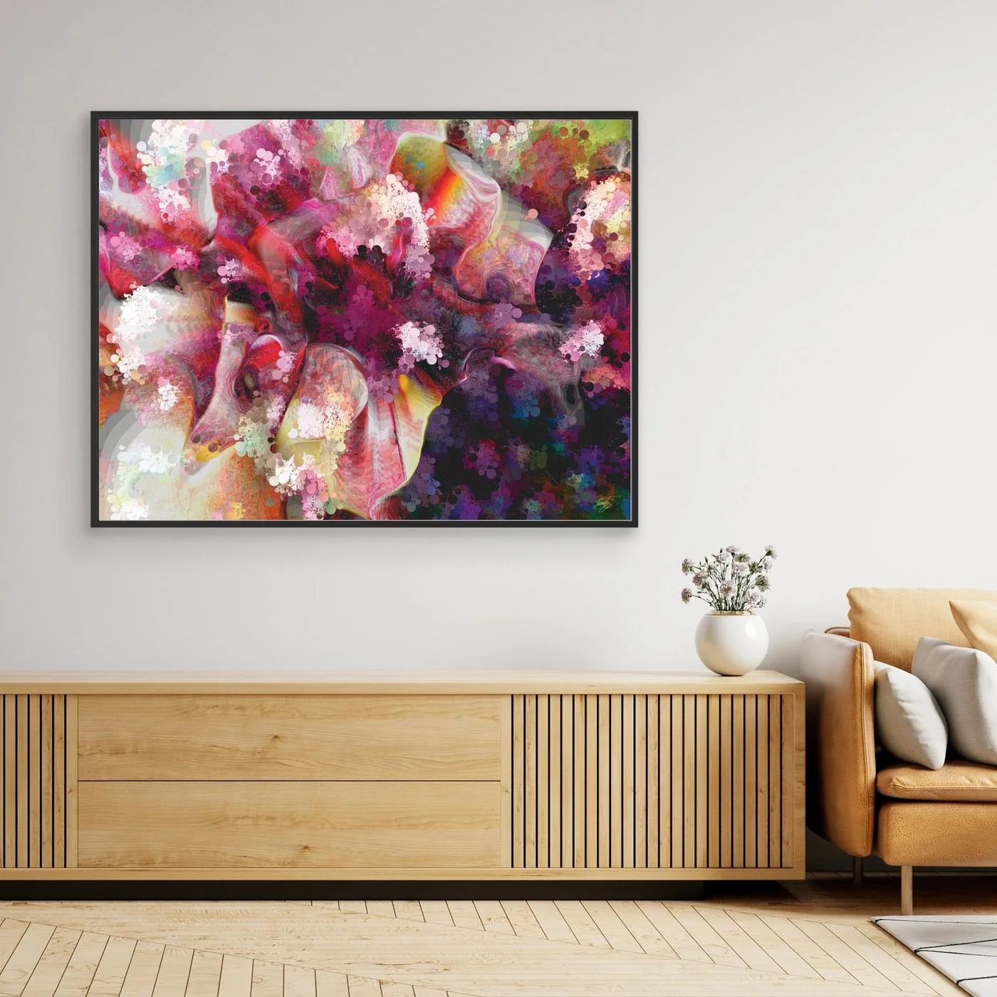 Vibrant abstract fine art print featuring pink, purple, and red floral textures, framed and ready to hang. Over wooden console