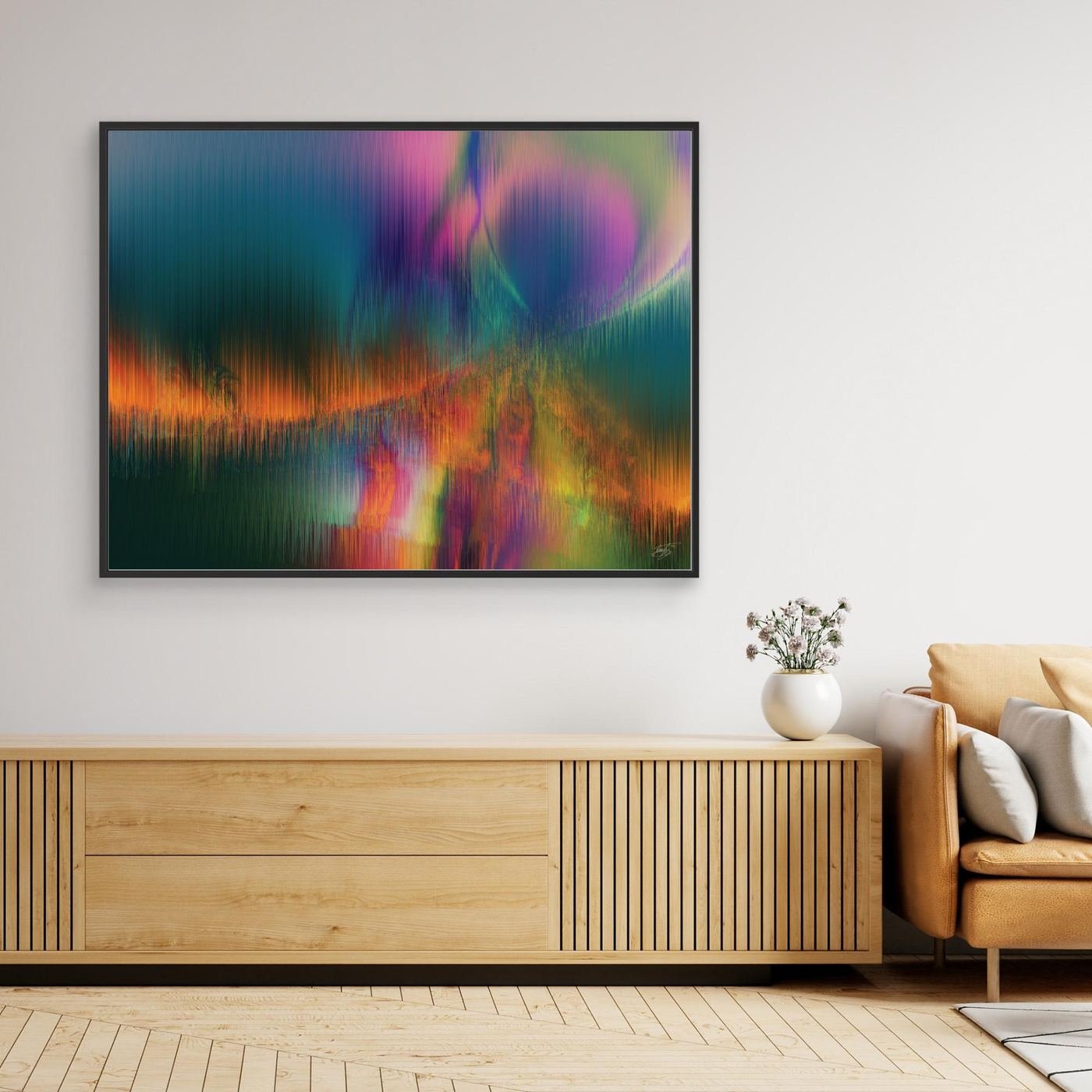 Abstract fine art print featuring vertical line textures reminiscent of a colorful landscape or aurora borealis with green, purple, and fiery orange tones, framed and ready to hang. Over console