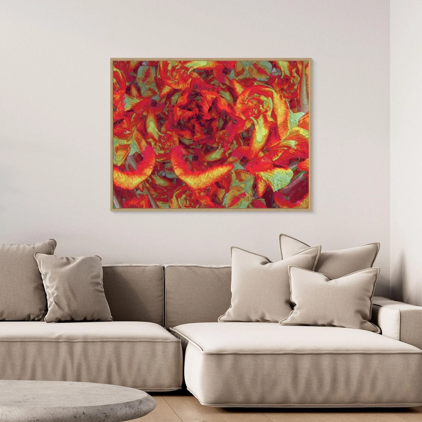 Abstract fine art print showcasing a dense, highly textured floral pattern in vibrant crimson red, fiery orange, and gold tones, framed and ready to hang. Over grey sofa