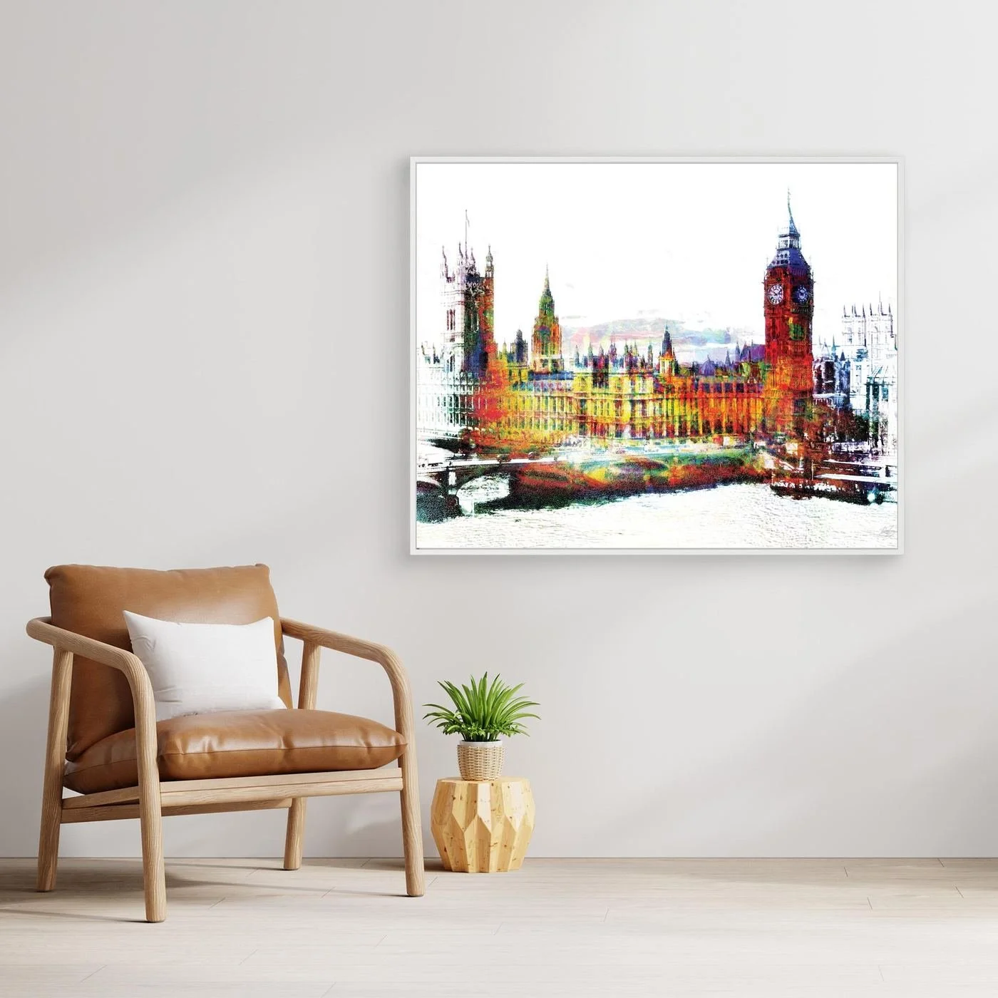 Expressionist fine art print of London's Houses of Parliament and Big Ben featuring high-contrast multicolor textures on a bright white background, framed and ready to hang. With chair