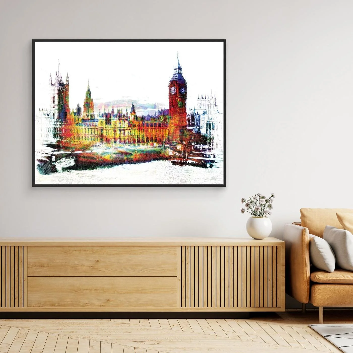 Expressionist fine art print of London's Houses of Parliament and Big Ben featuring high-contrast multicolor textures on a bright white background, framed and ready to hang. Over wooden console