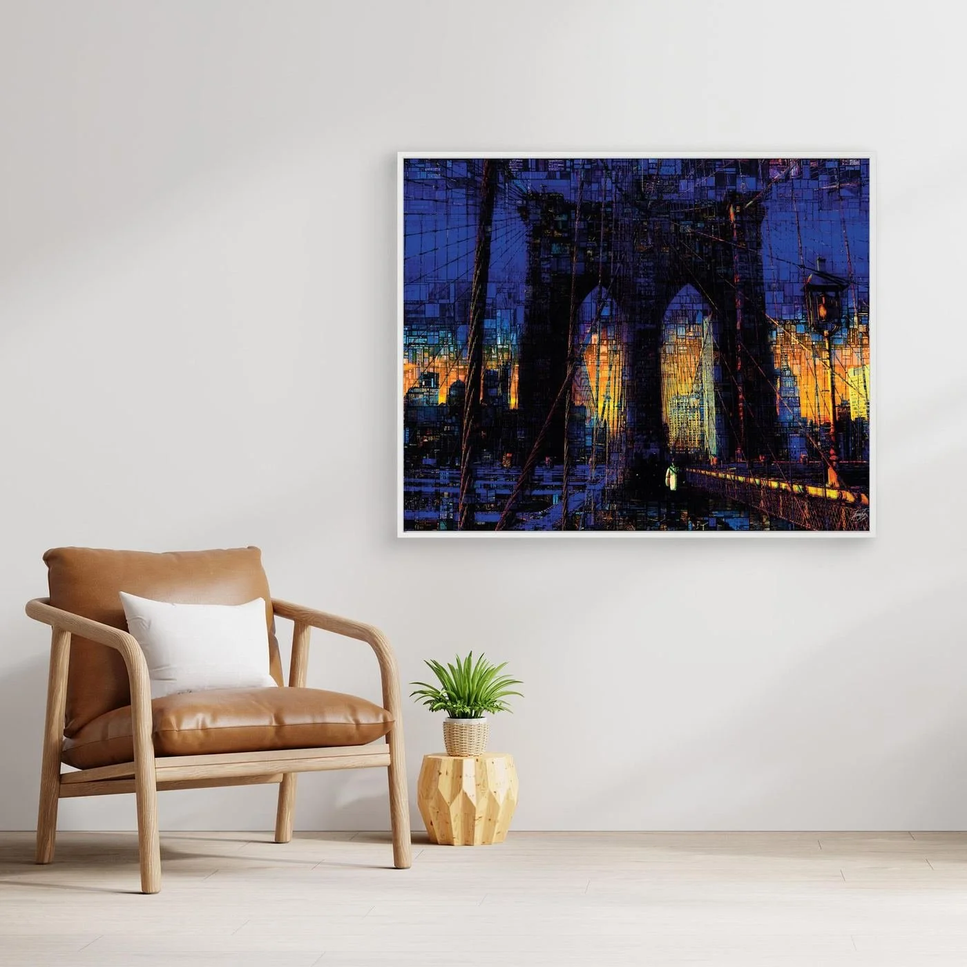 Abstract fine art print of the Brooklyn Bridge at sunset featuring a complex mosaic and pixelated texture in deep blue and vibrant golden tones, framed and ready to hang. With chair