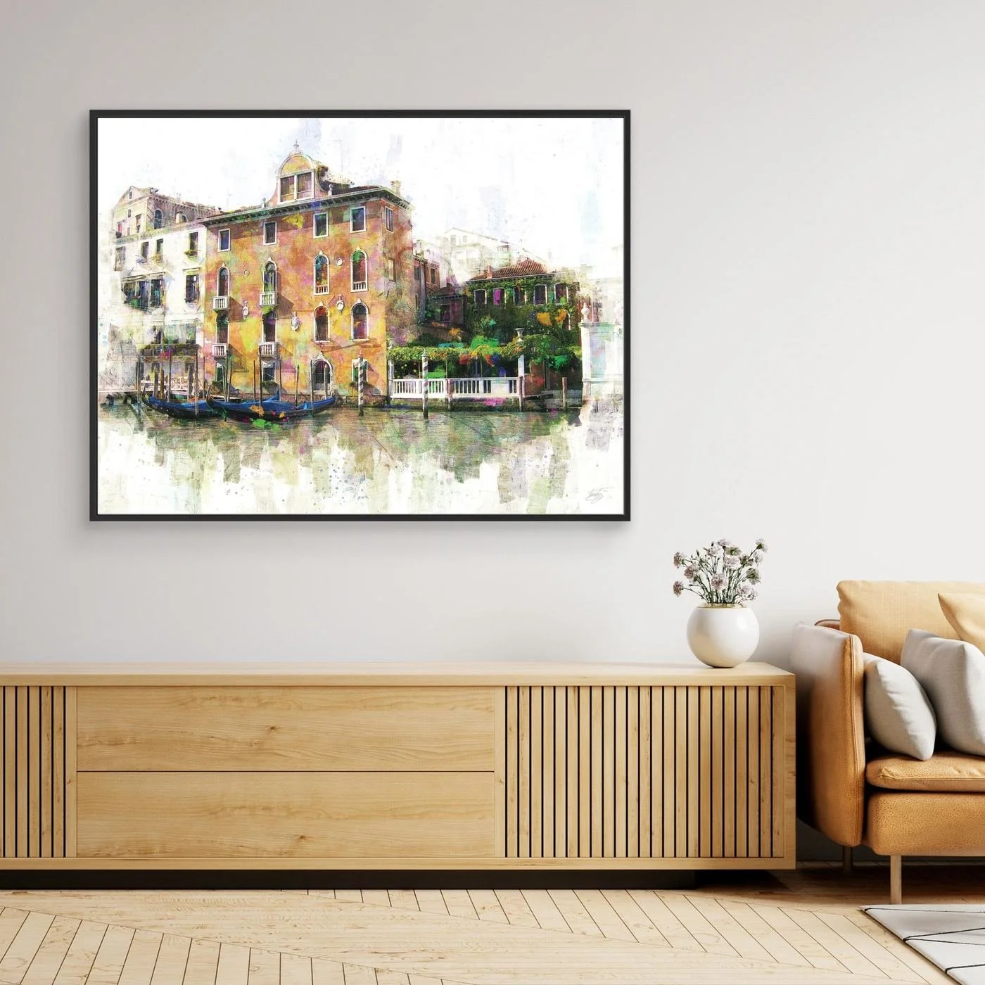 Vibrant fine art print of a classic Venice canal landscape with historic Italian architecture, docked gondolas, and colorful reflections on the water, framed and ready to hang. Over wooden console