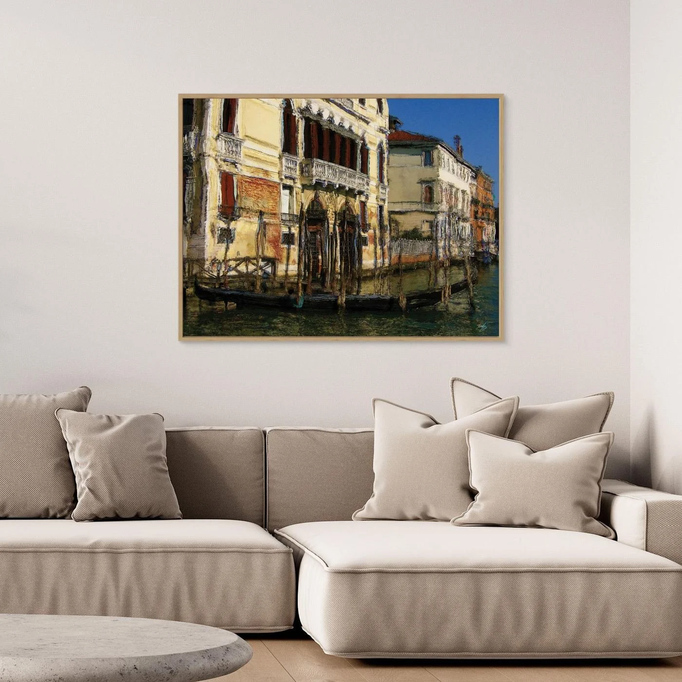 Expressionist fine art print of a historic Venetian palazzo along the Grand Canal with a gondola and textured oil painting brushstrokes, framed and ready to hang. Over grey couch