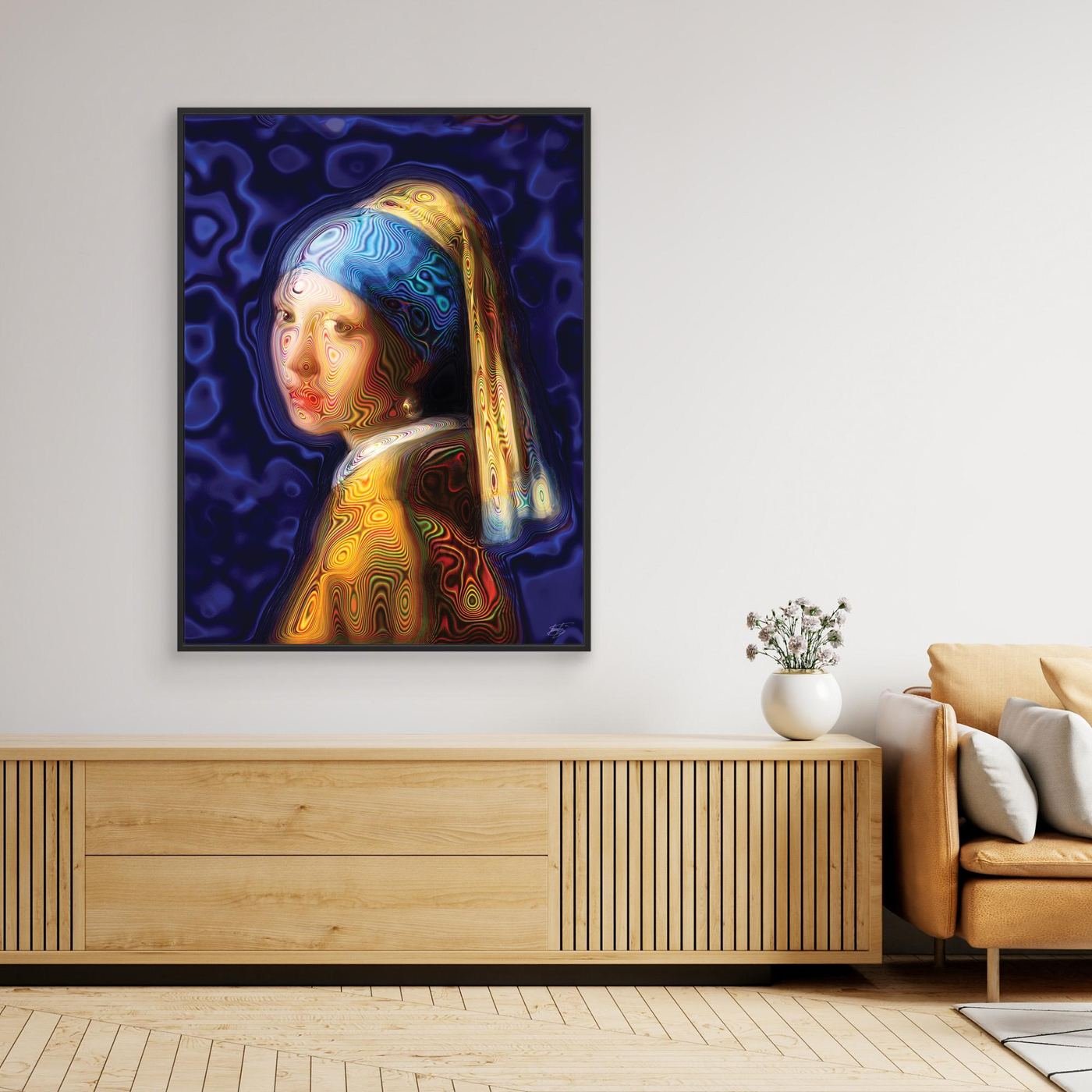 Contemporary fine art print of a psychedelic reinterpretation of Vermeer's Girl with a Pearl Earring, with vibrant blue and gold patterns, framed and ready to hang. Over wooden console