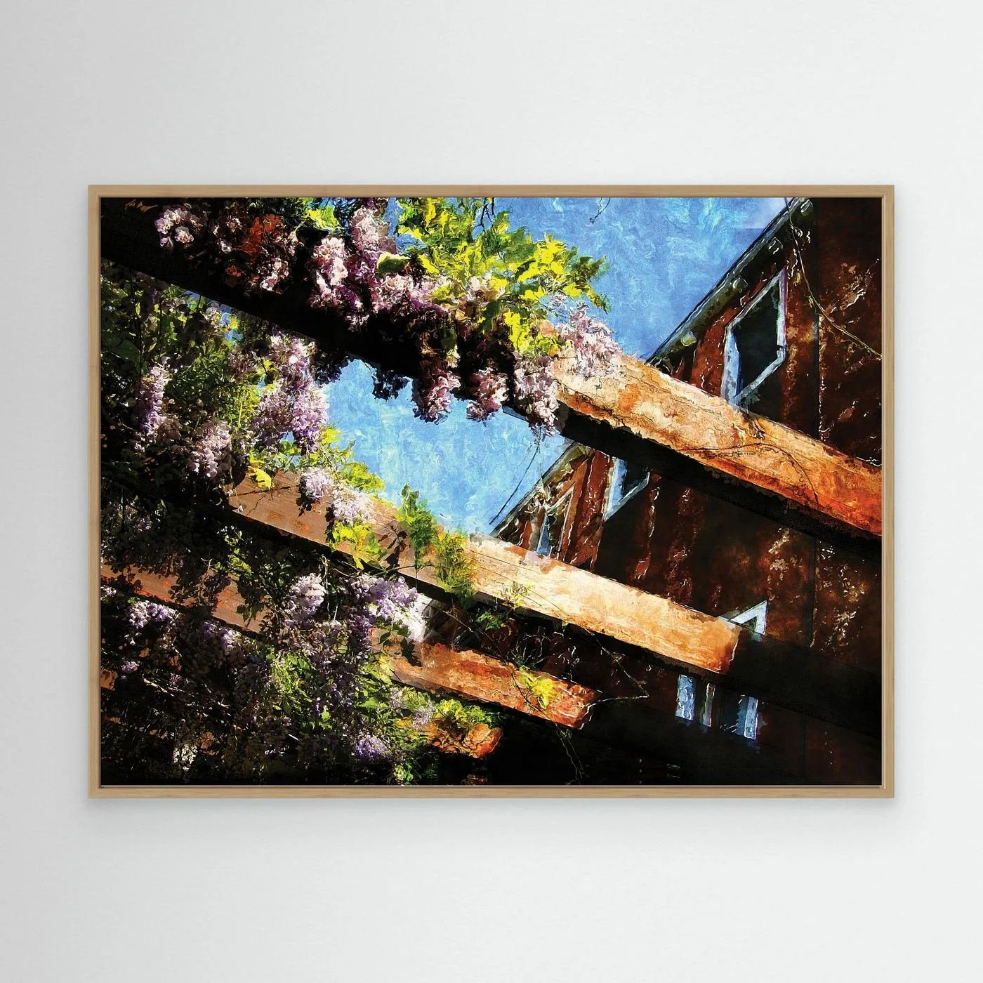 Impressionist fine art print showcasing purple wisteria flowers climbing over rustic wooden pergola beams against a textured blue sky, framed and ready to hang. With wooden frame