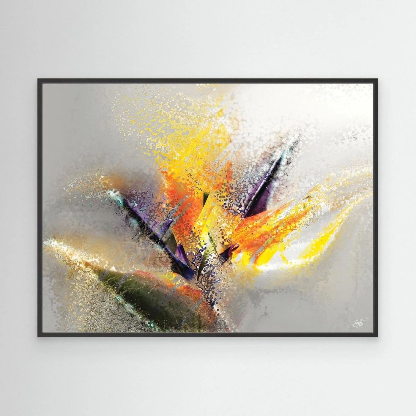 Abstract fine art print evoking an exotic flower with stipple and splash textures in vibrant yellow, orange, and purple over a light gray background, framed and ready to hang. With black frame