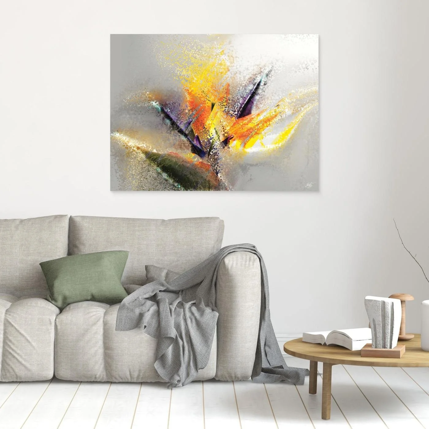 Abstract fine art print evoking an exotic flower with stipple and splash textures in vibrant yellow, orange, and purple over a light gray background, framed and ready to hang. In living room