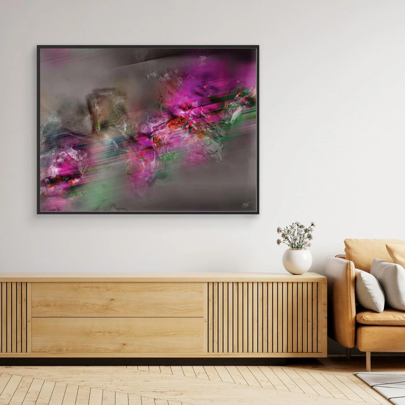 Dynamic digital art print featuring vibrant magenta and green streaks of motion contrasting against a smoky grey background, framed and ready to hang. Over wooden console