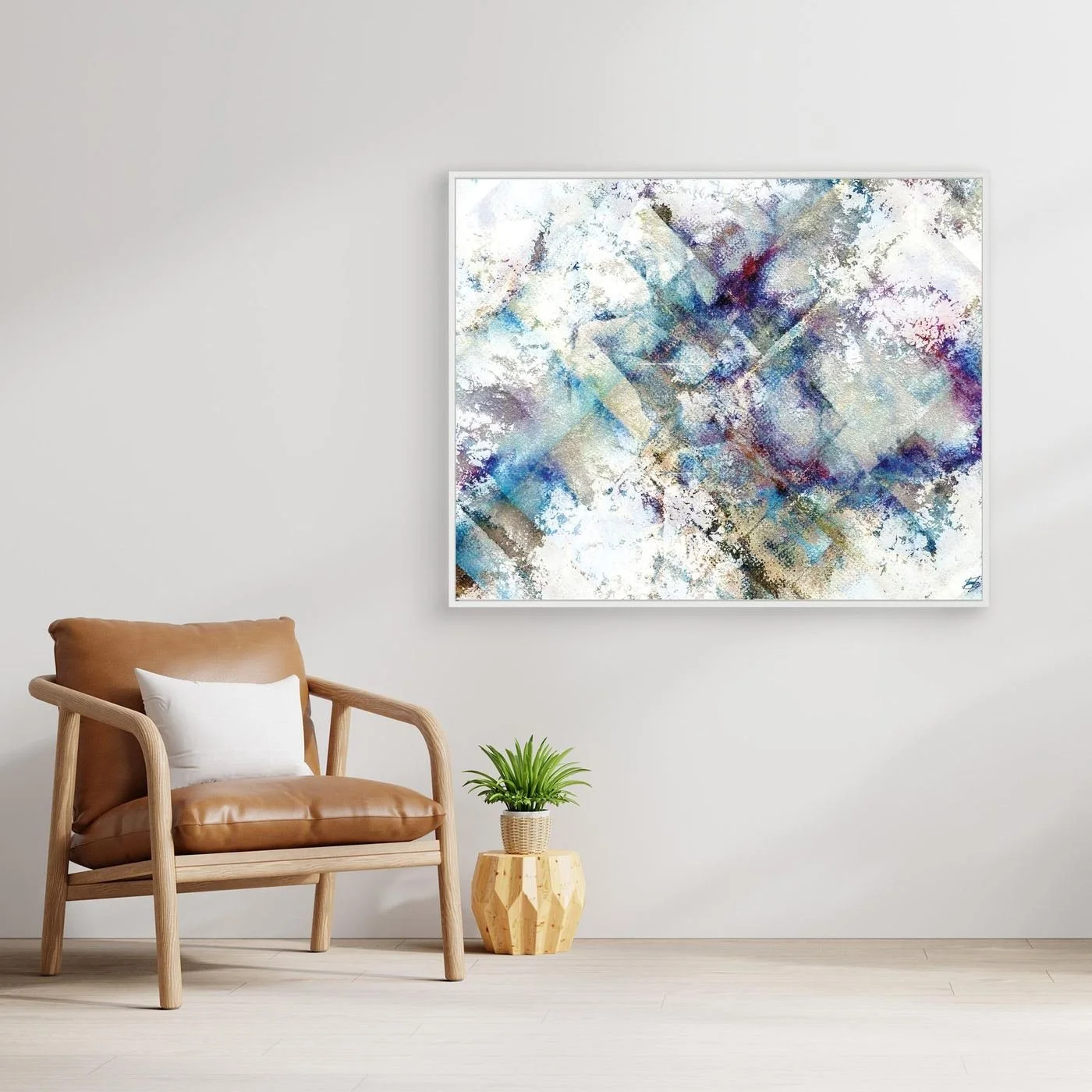 Abstract fine art print featuring weathered watercolor textures and subtle geometric patterns in blue, purple, and beige tones on a bright white background, framed and ready to hang. With chair