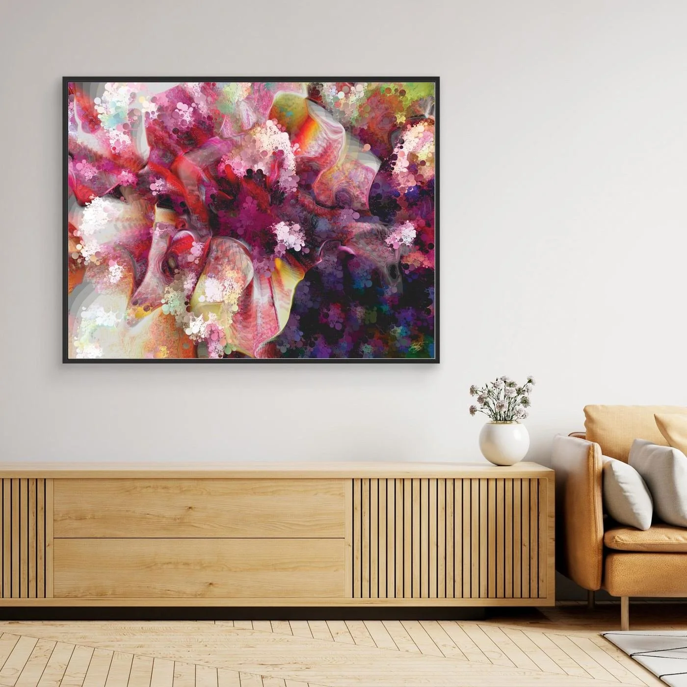 Vibrant abstract fine art print featuring pink, purple, and red floral textures, framed and ready to hang. Over wooden console