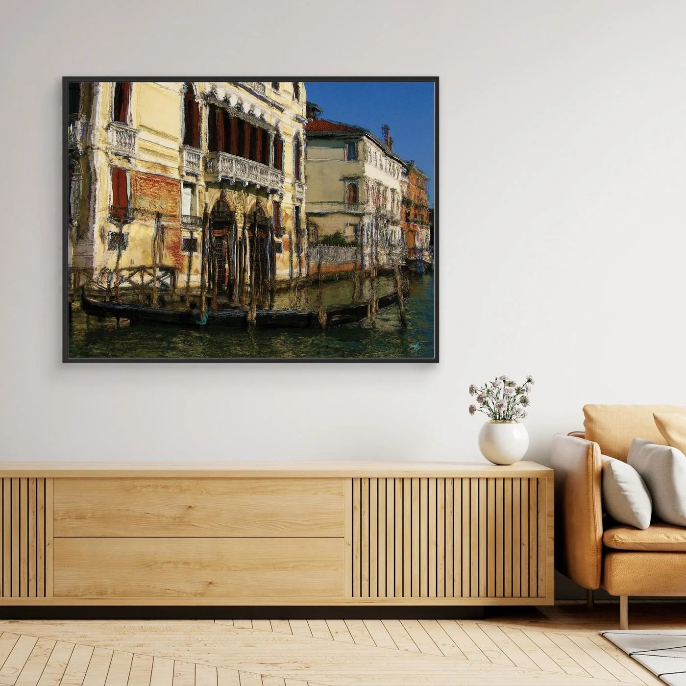 Expressionist fine art print of a historic Venetian palazzo along the Grand Canal with a gondola and textured oil painting brushstrokes, framed and ready to hang. Over wooden console