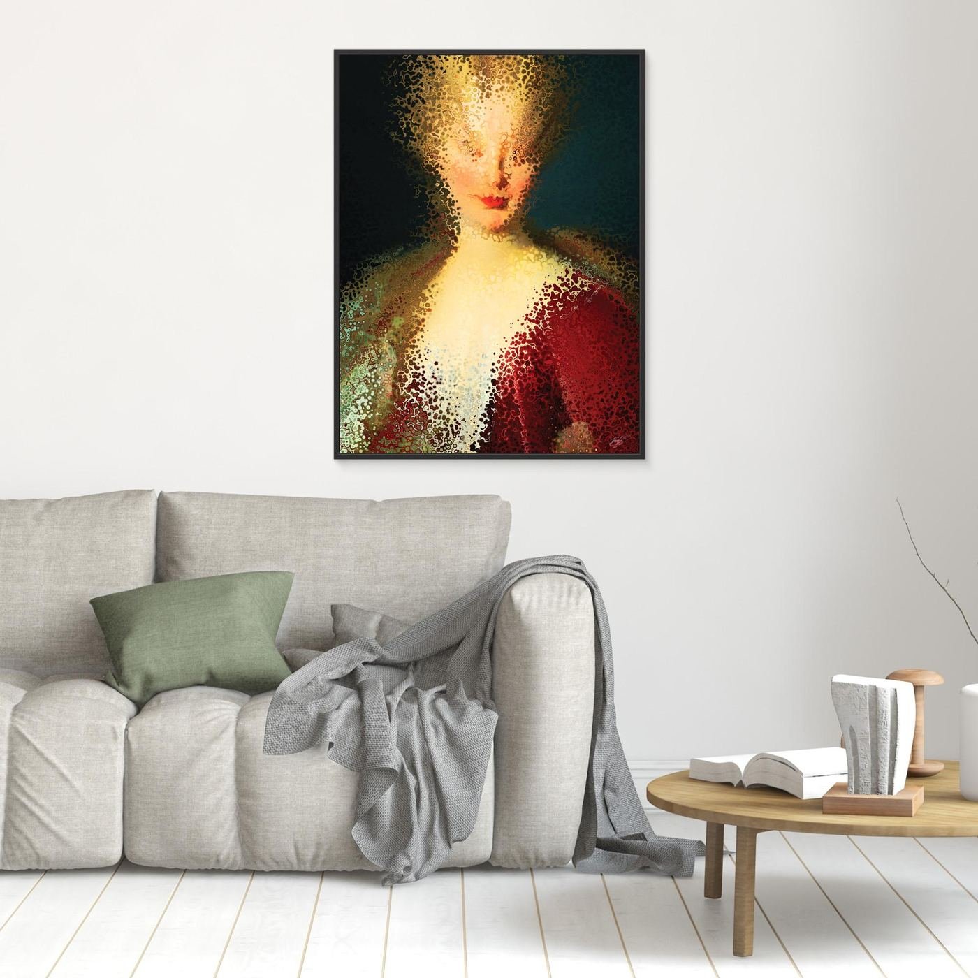 Contemporary fine art print of a deconstructed classical portrait of a woman dissolving into stipple textures in warm gold and deep crimson red, framed and ready to hang. In living room