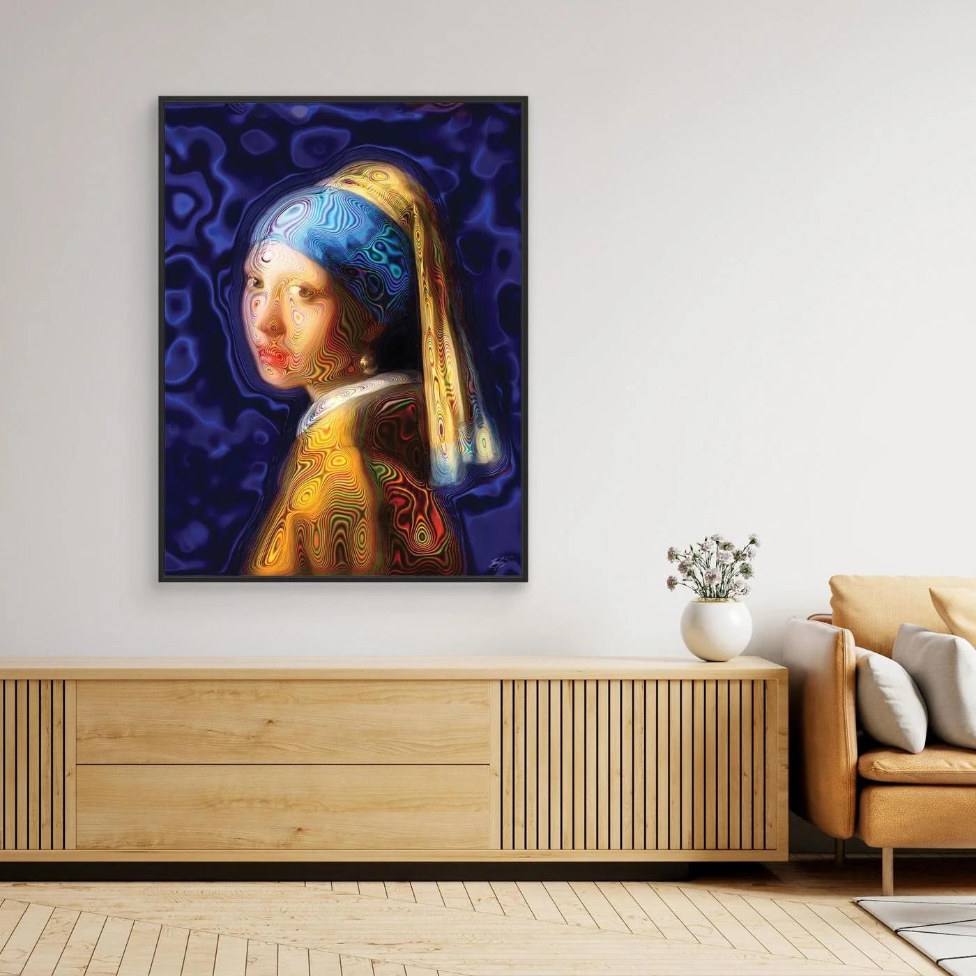 Contemporary fine art print of a psychedelic reinterpretation of Vermeer's Girl with a Pearl Earring, with vibrant blue and gold patterns, framed and ready to hang. Over wooden console