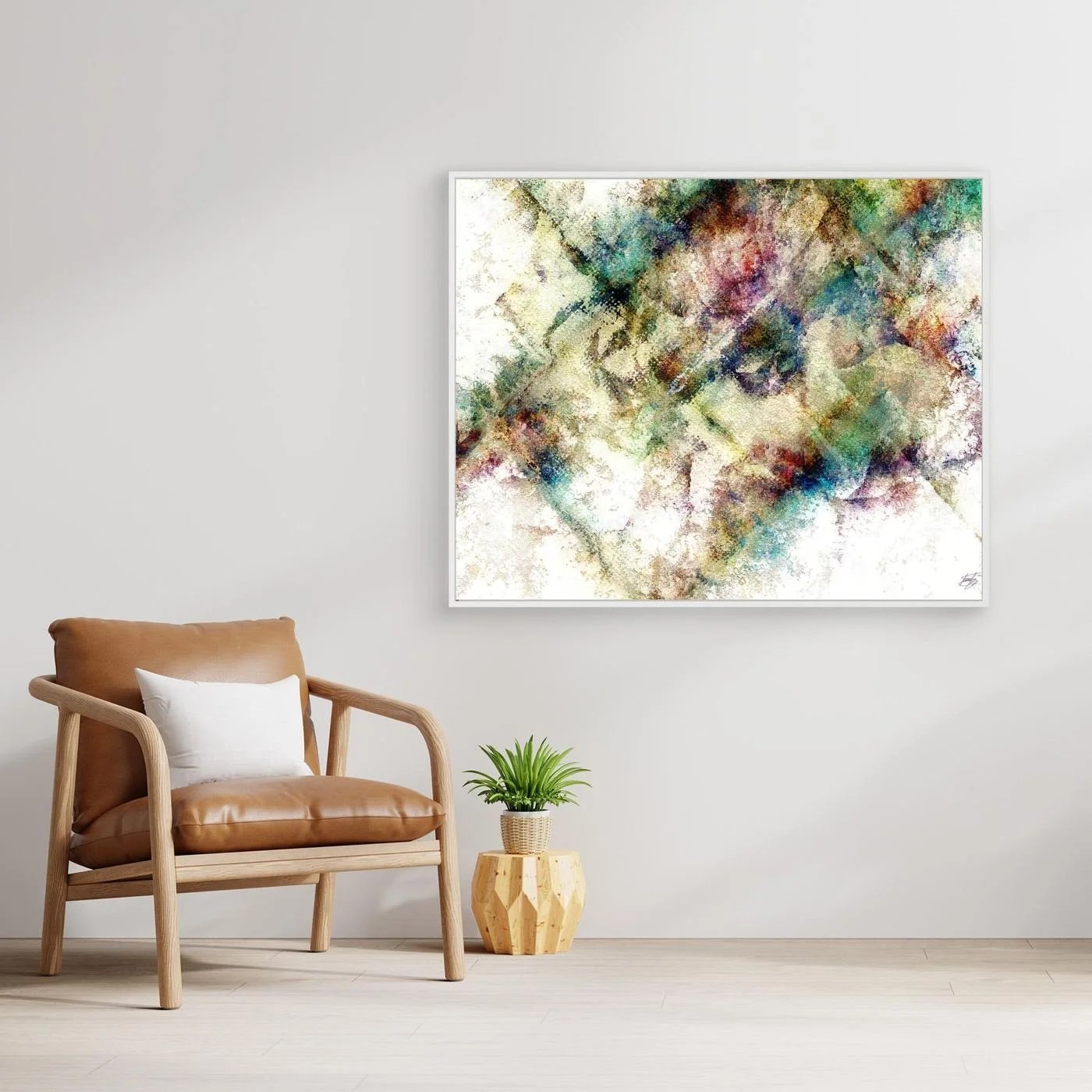 Abstract fine art print with heavy distressed textures and geometric overlays in green, gold, and burgundy tones on a bright background, framed and ready to hang. With chair
