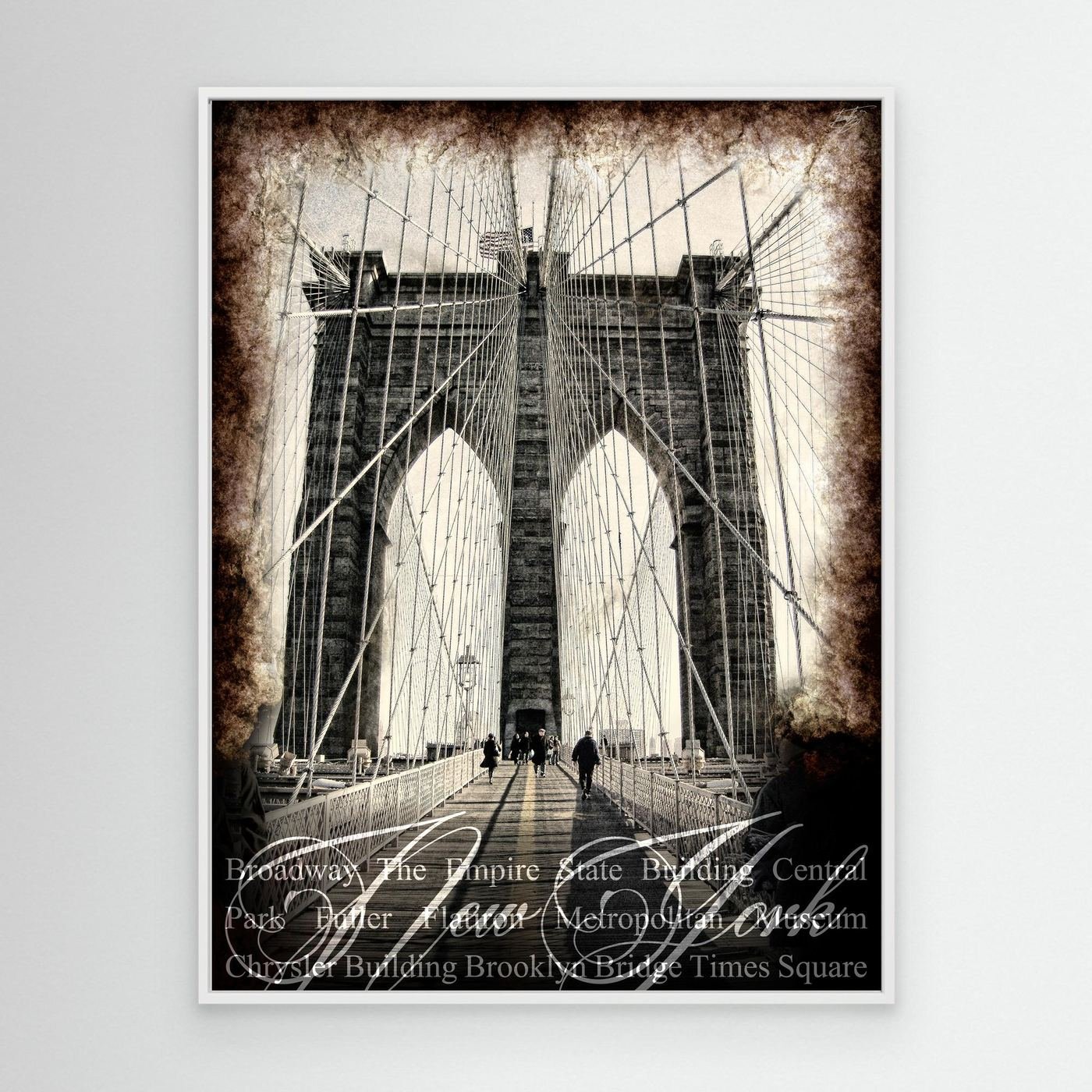 Vintage fine art print of New York City of Brooklyn Bridge with a textured sepia background and elegant typography of NYC landmarks, framed and ready to hang. With white frame
