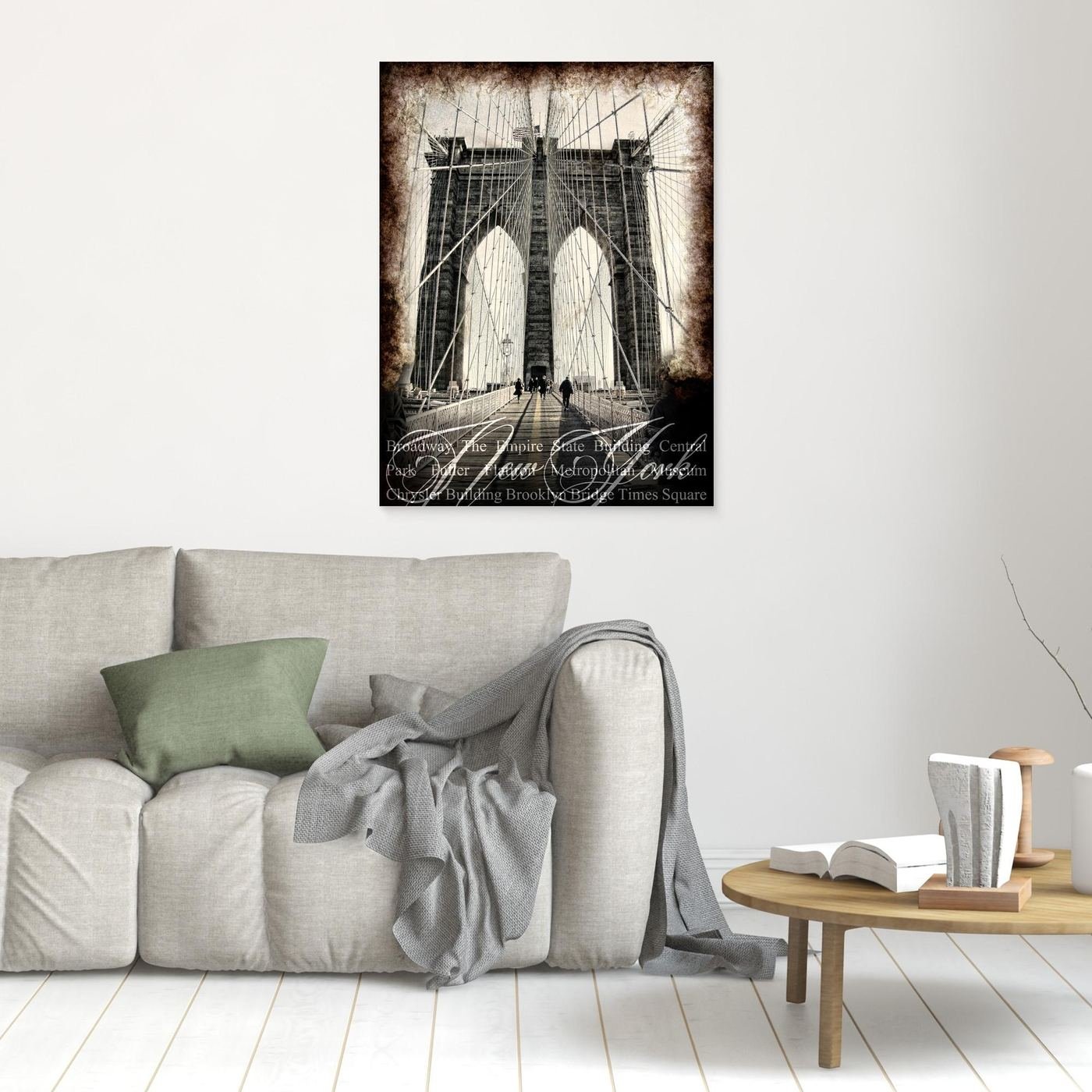 Vintage fine art print of New York City of Brooklyn Bridge with a textured sepia background and elegant typography of NYC landmarks, framed and ready to hang. In living room