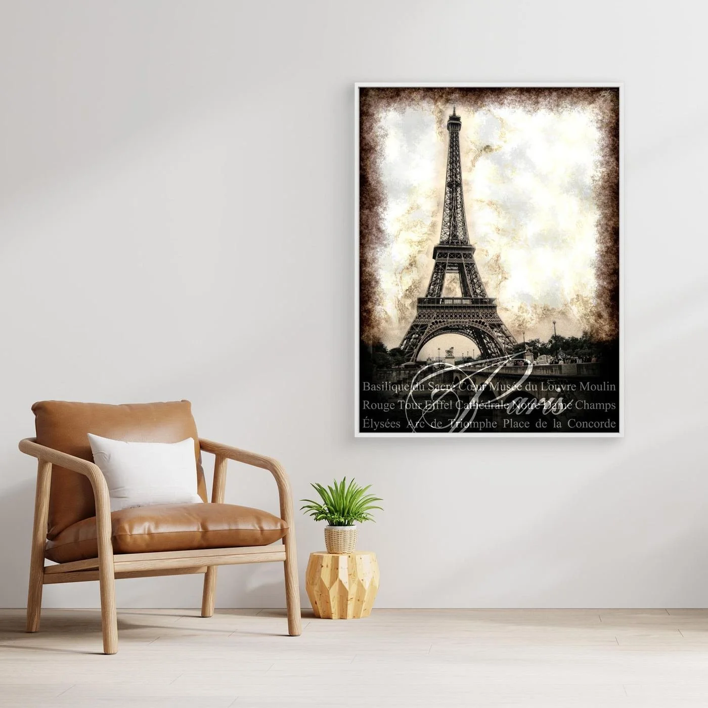 Vintage fine art print of Paris featuring the Eiffel Tower with a textured sepia background and elegant typography of French landmarks, framed and ready to hang. With chair