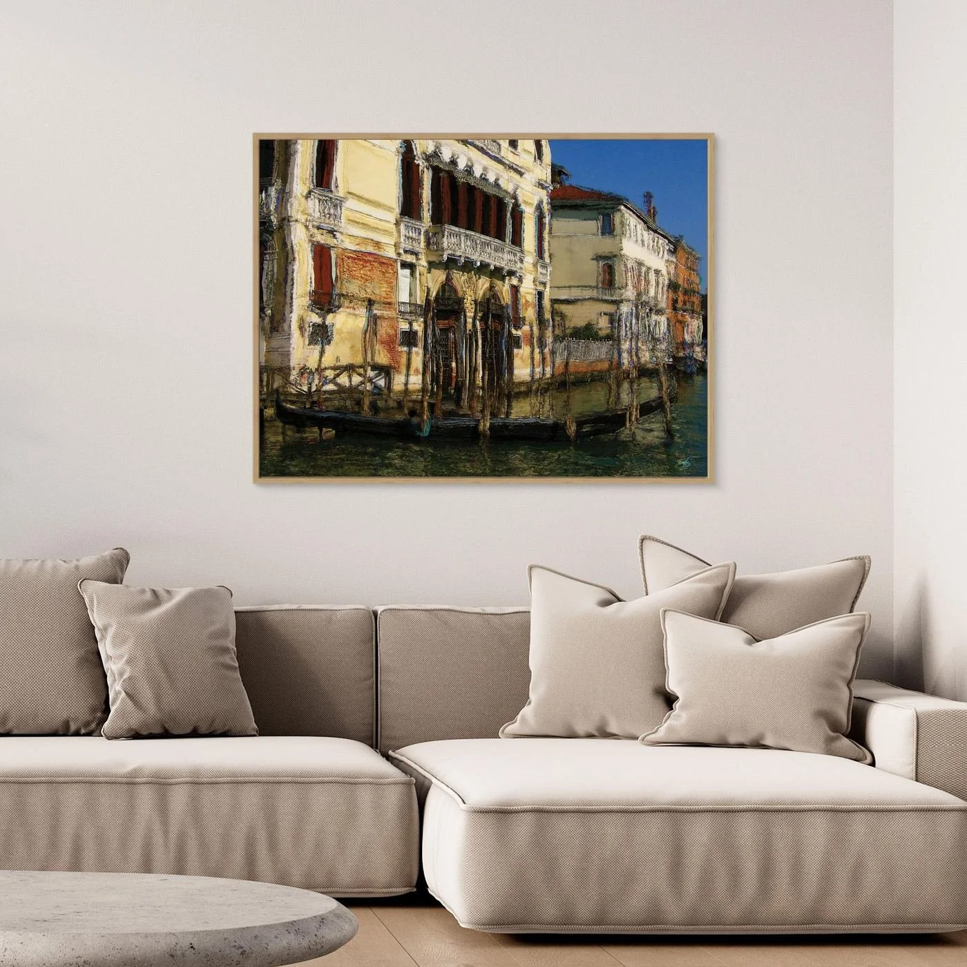 Expressionist fine art print of a historic Venetian palazzo along the Grand Canal with a gondola and textured oil painting brushstrokes, framed and ready to hang. Over grey couch